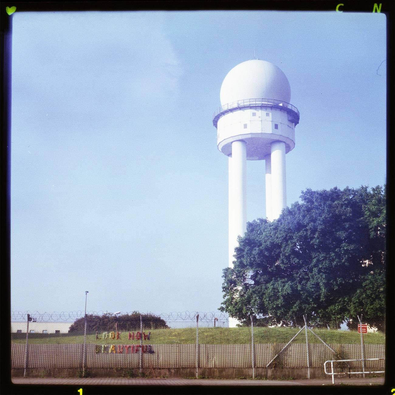Florian Reischauer Color Photograph - a Piece of a Tower - Pieces of Berlin