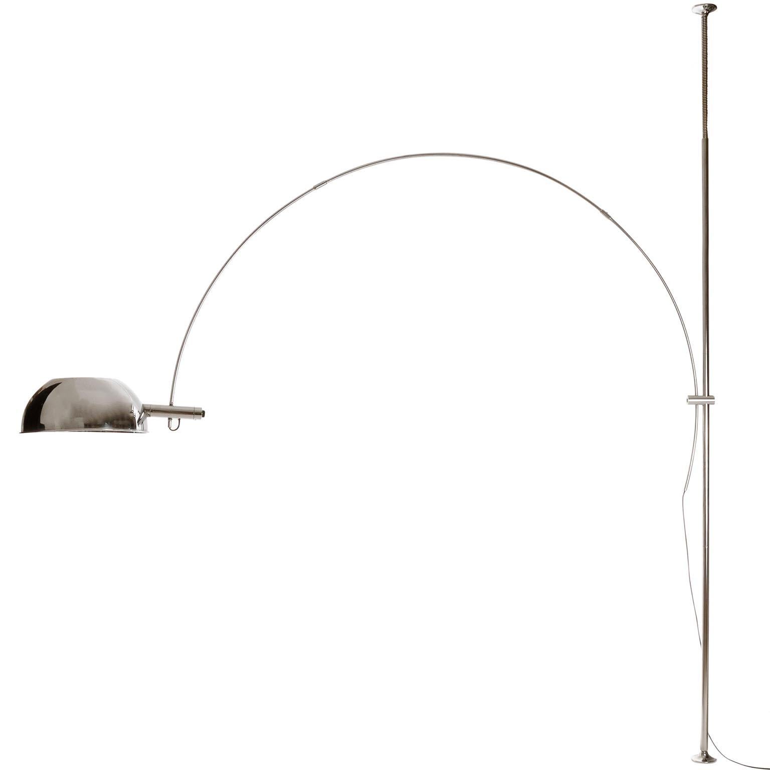 A ceiling to floor lamp by Florian Schulz, Germany, manufactured in midcentury, circa 1970 (late 1960s or early 1970s).
It is made of polished nickel plated brass and metal. The inner side of the lampshade is brushed.
The fixture is clamped
