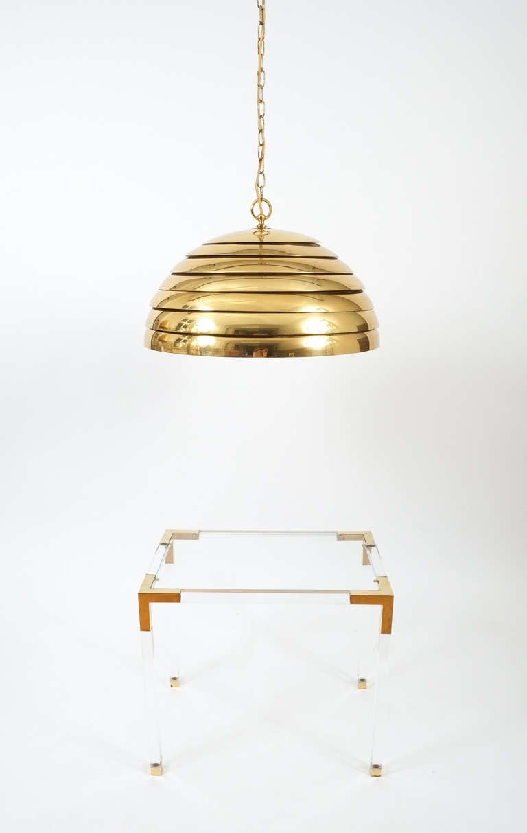 Florian Schulz large brass dome pendant with translucent diffuser, Germany, circa 1970

Stunning multilayered/lamellated giant brass pendant by Vereinigte Werkstaette/ Germany. One single bulb (200W max). Dimensions are 23.6