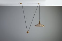 Florian Schulz Onos 55 counterbalance pendant lamp brass Germany 1970