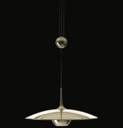 Florian Schulz Onos 55 in brass with center counterweight