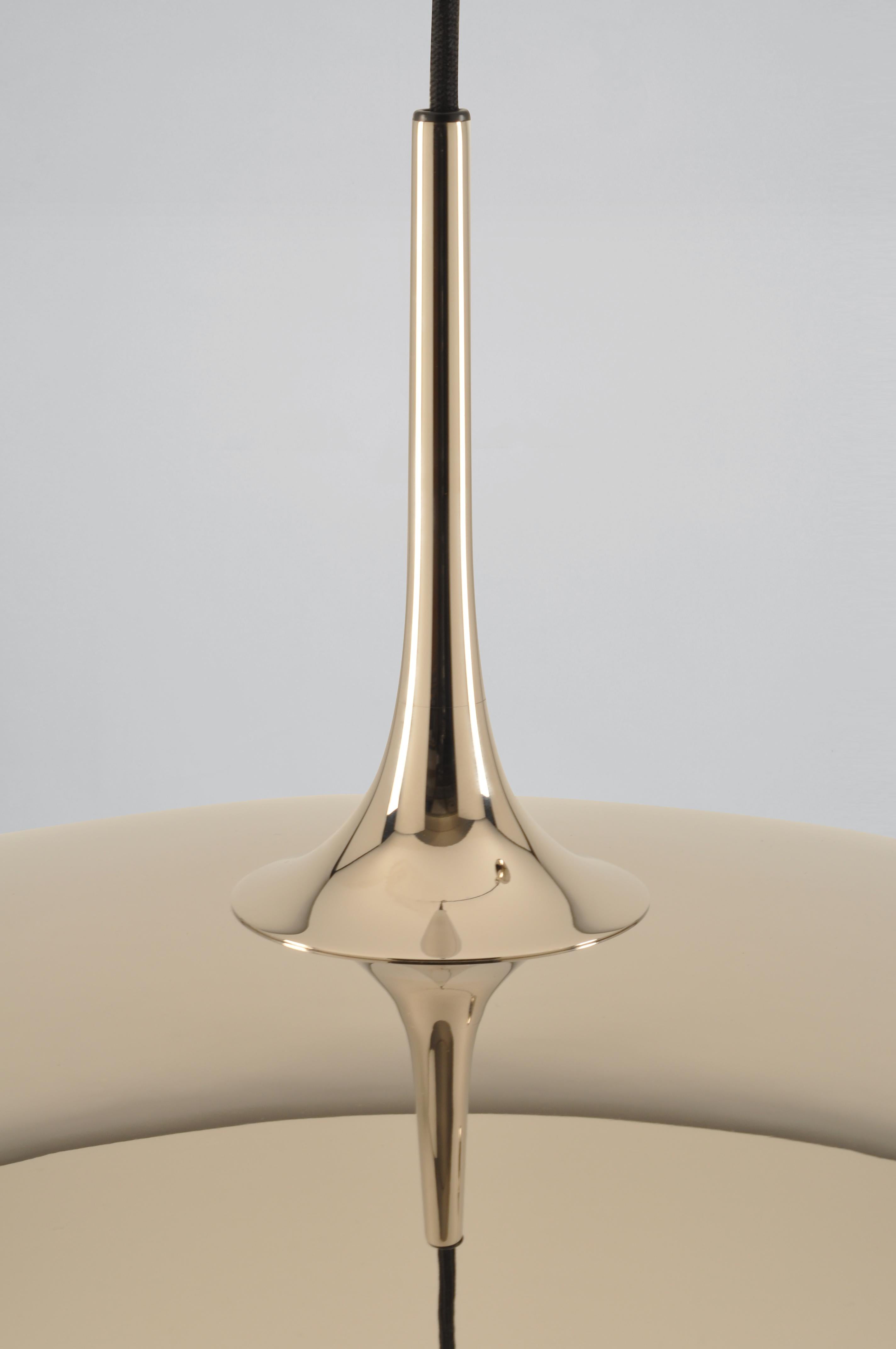 Iconic design by Florian Schulz. This lamp is in perfect condition and available in nickel or polished brass. The height is adjustable, socket: E27. 

To be on the safe side, the lamp should be checked locally by a specialist concerning local