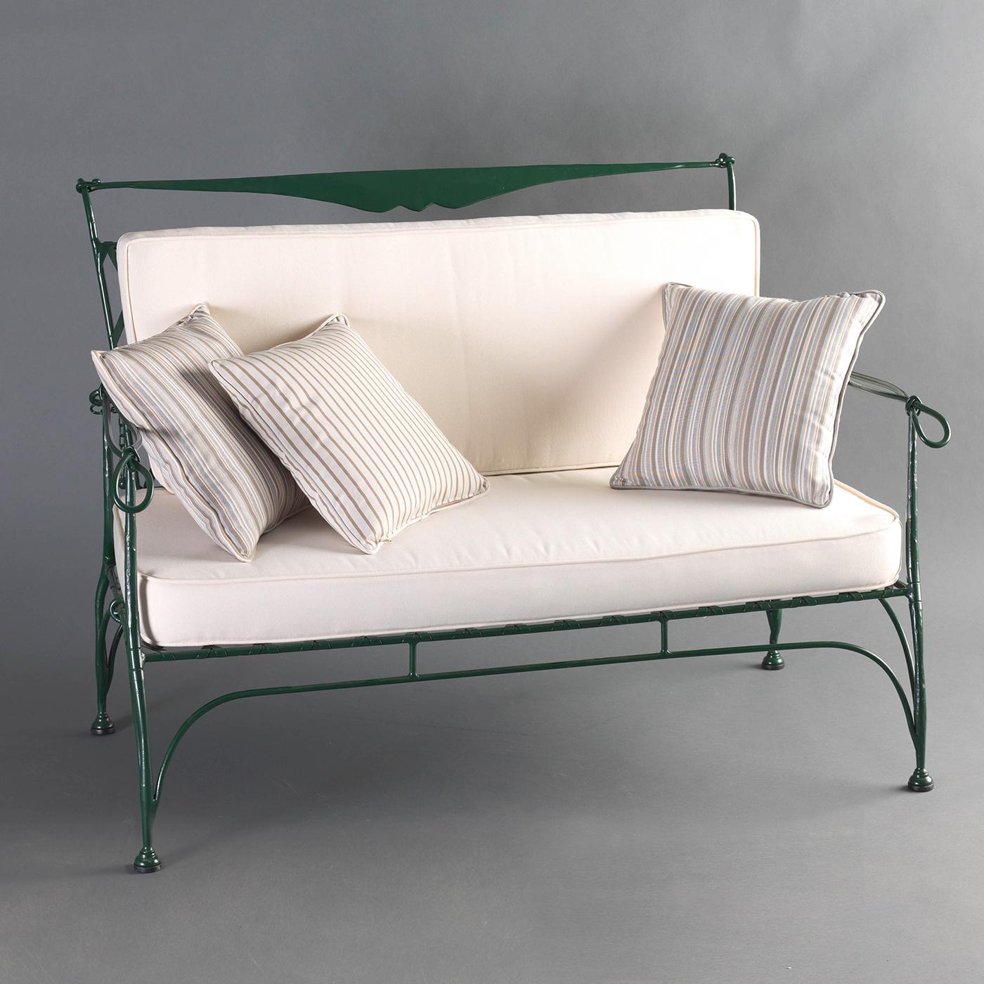 Part of the Florio Collection, this two-seat sofa will make a charming addition to a patio, veranda, or poolside decor. The traditional design is inspired by Tuscan countryside style and rendered in exquisite details by the expert craftsmen at