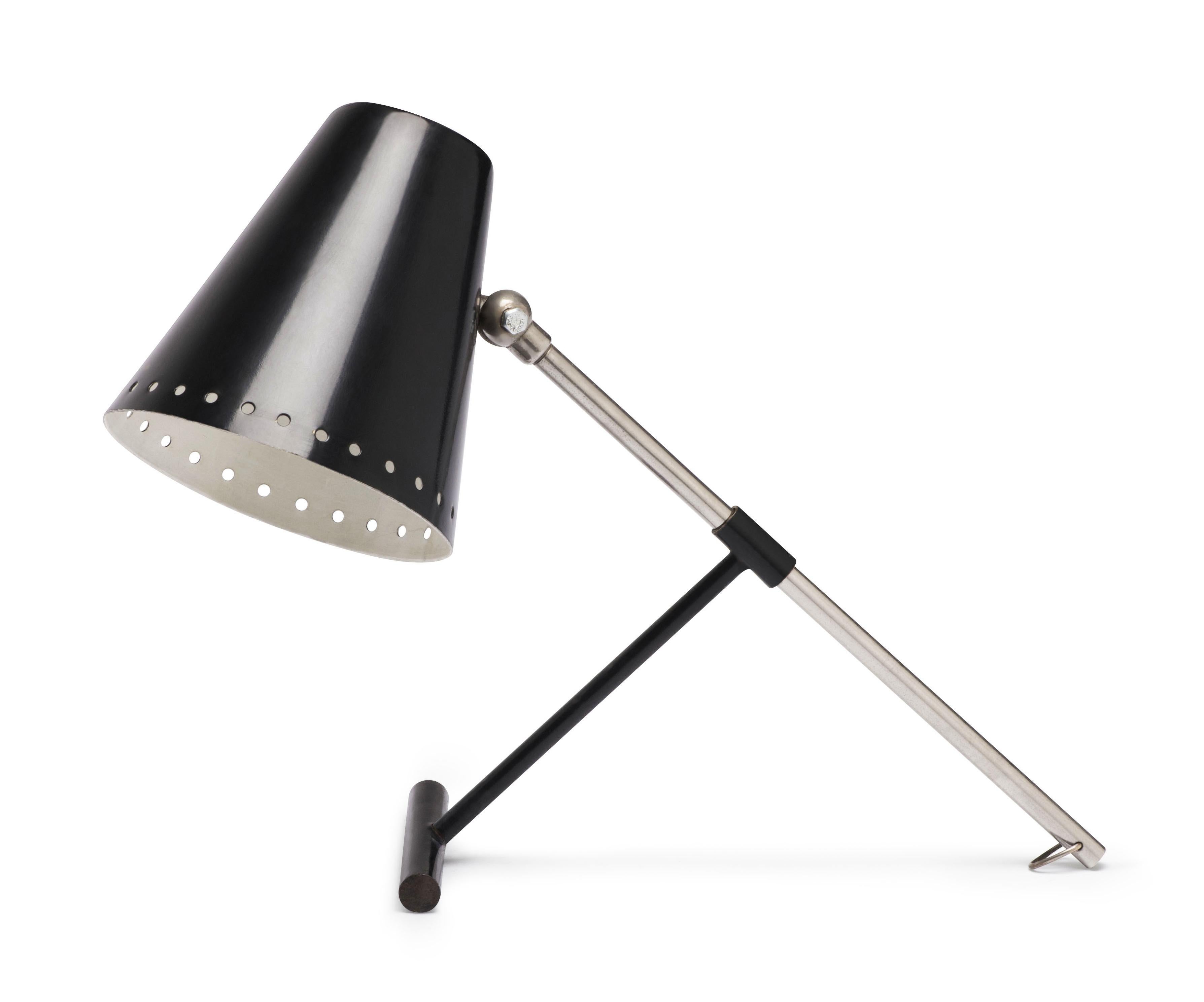 Classic mid-century European table or wall lamp.

Fiedeldij was known for his modern, abstract designs, inspired by art movements such as De Stijl and Bauhaus. His creations were often characterized by the use of simple geometric shapes and bright