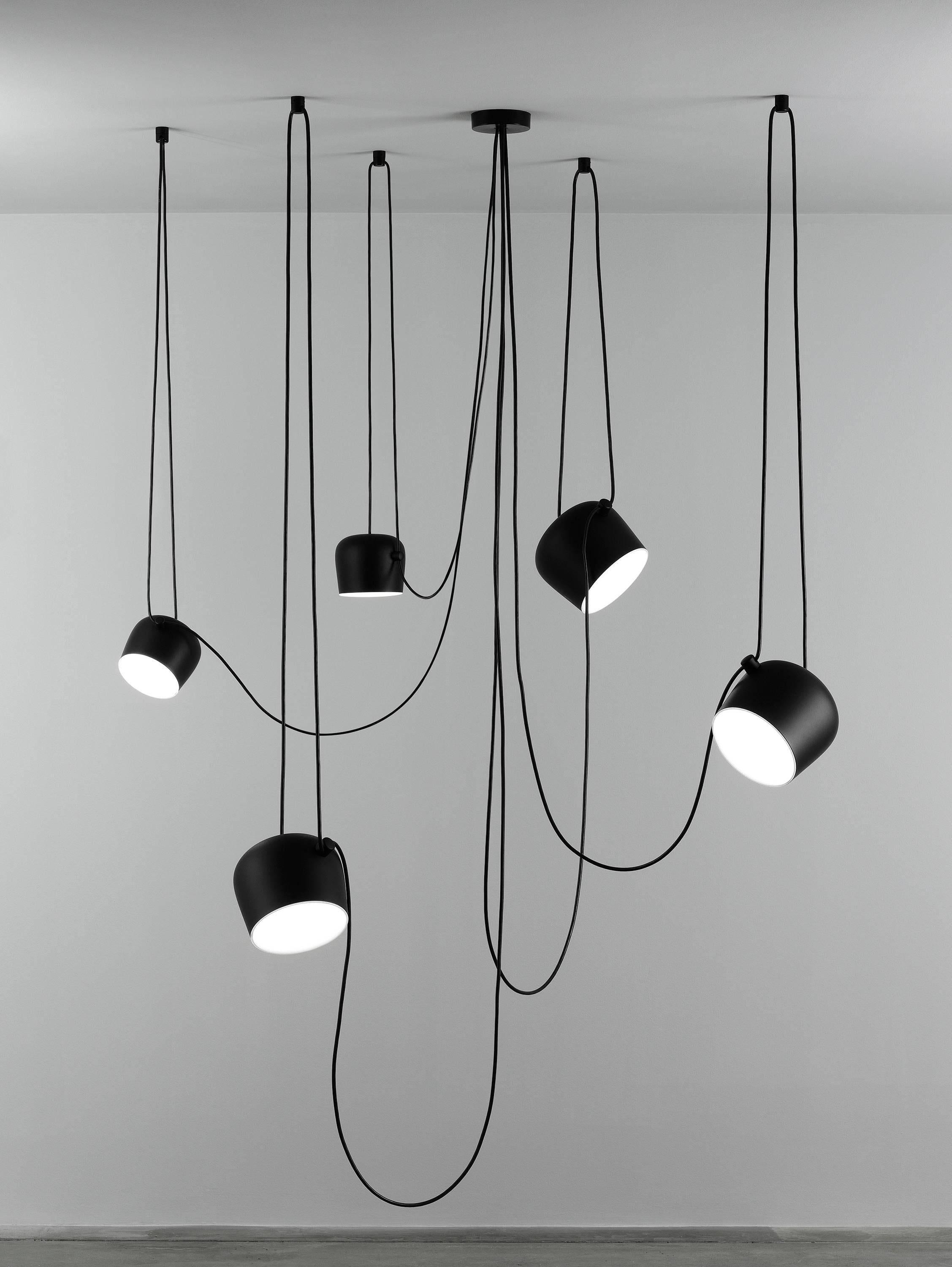 FLOS Aim Black Five-Lamp Light Set w/ Canopy by Ronan & Erwan Bouroullec

Created by the Bouroullec brothers in 2010, the AIM ceiling light is a design stripped to its most basic—and beautiful—essence. This innovative form of modern pendant lighting
