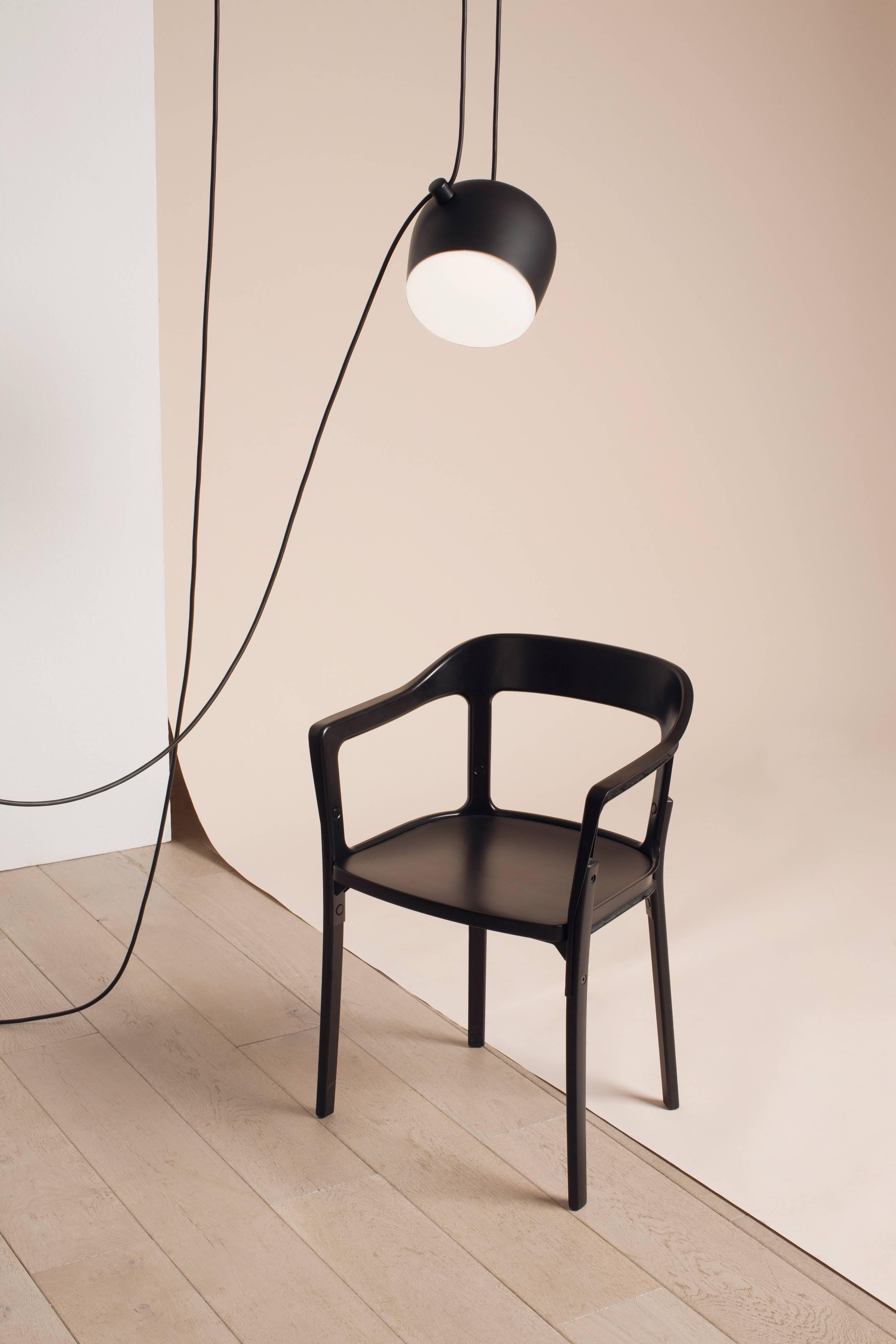 FLOS Aim Pendant Light in Black by Ronan & Erwan Bouroullec

Created by the Bouroullec brothers in 2010, the AIM ceiling light is a design stripped to its most basic—and beautiful—essence. This innovative form of modern pendant lighting is