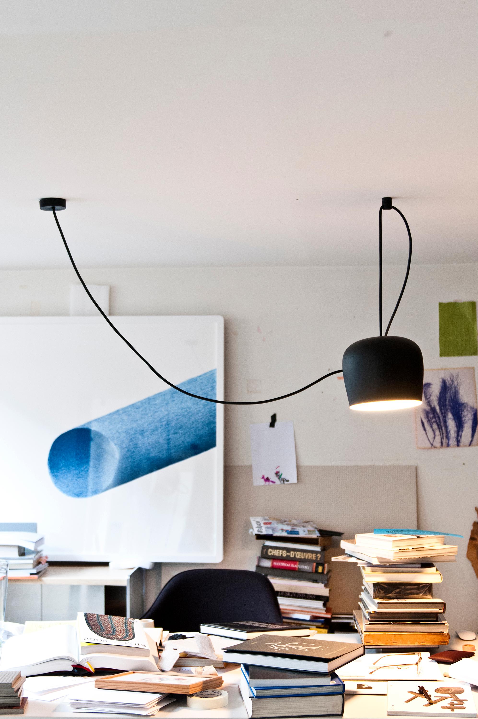 FLOS AIM Small Pendant Light in Black by Ronan & Erwan Bouroullec

Like the others in the AIM family created by the Bouroullec brothers in 2010, the AIM-Small ceiling light is a design stripped to its most basic—and beautiful—essence. This