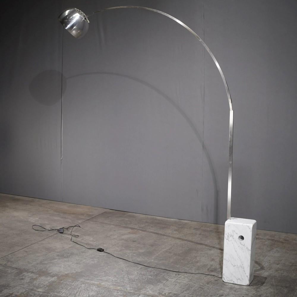The Flos Arco Floor Lamp is a timeless piece of lighting design. Created by Flos, this iconic lamp features a sleek, curved arm and a sturdy marble base, providing both functional illumination and a striking aesthetic statement.
