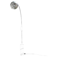 Lampada da terra Flos Arco con base in marmo di Achille Castiglioni