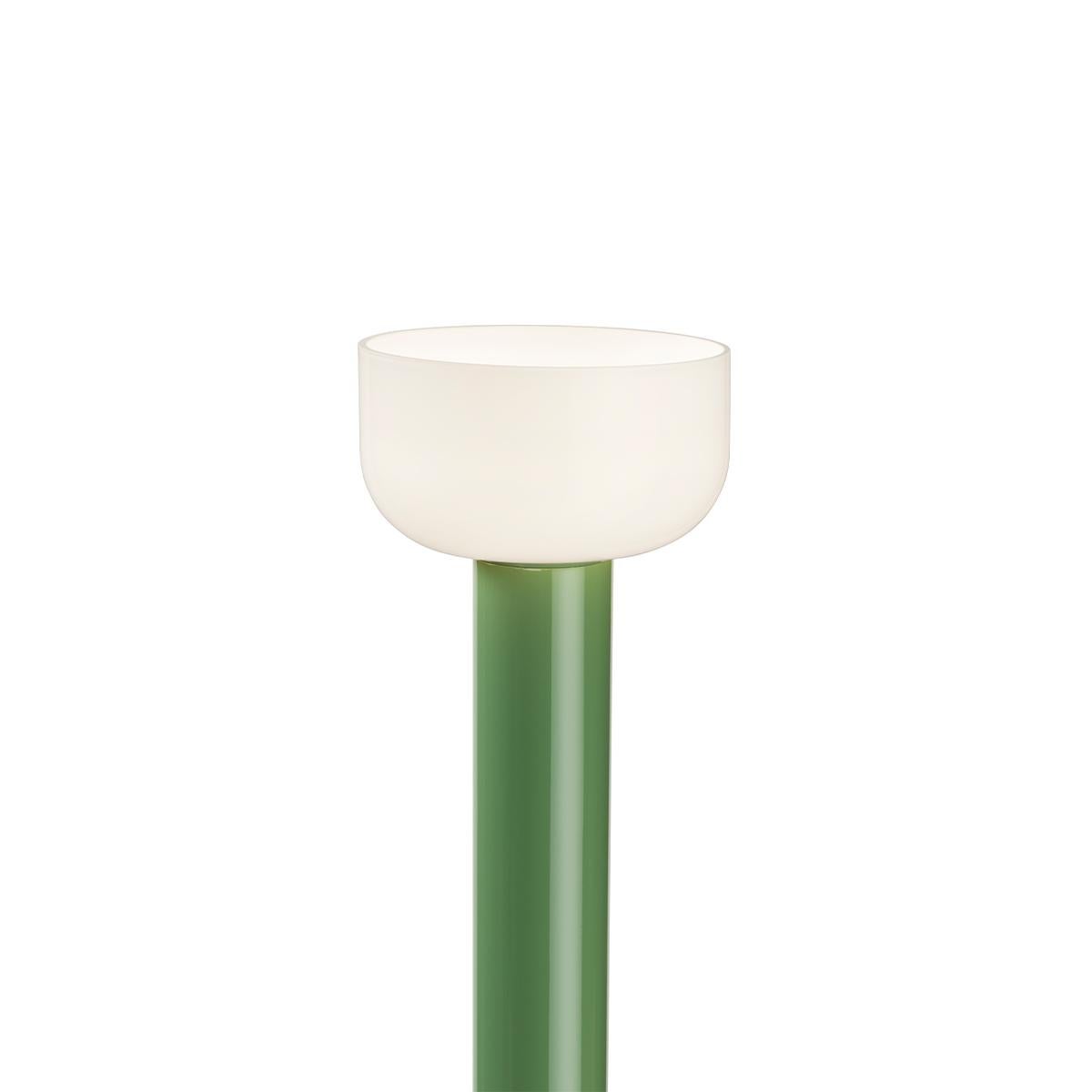 Floor lamp with indirect light. Stem in painted aluminium: shiny white, brick, cioko, green. Reflector in shiny opal white and grey blown glass. Electrical cable of 270 cm usable length with foot dimmer switch for ON/OFF function and brightness