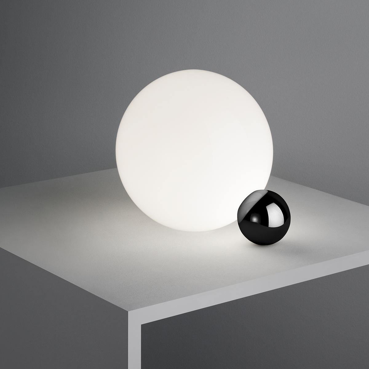 They say that imitation is the sincerest form of flattery, and with the Copycat table lamp designer Michael Anastassiades shows us just how sweet it can be. This fixture is made of two spheres connecting with each other, one small and in a precious