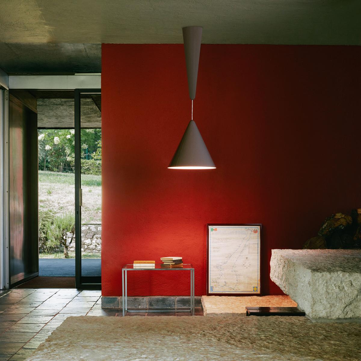 Pendant light with direct lighting designed by A. Castiglioni, composed of a ceiling rose and diffuser. Body in aluminium with external paint in 3 different colour options (shiny white, beaver brown, and cherry red), while the inside of the diffuser