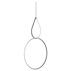 Flos Drop Up e Large Circle Arrangements Light di Michael Anastassiades