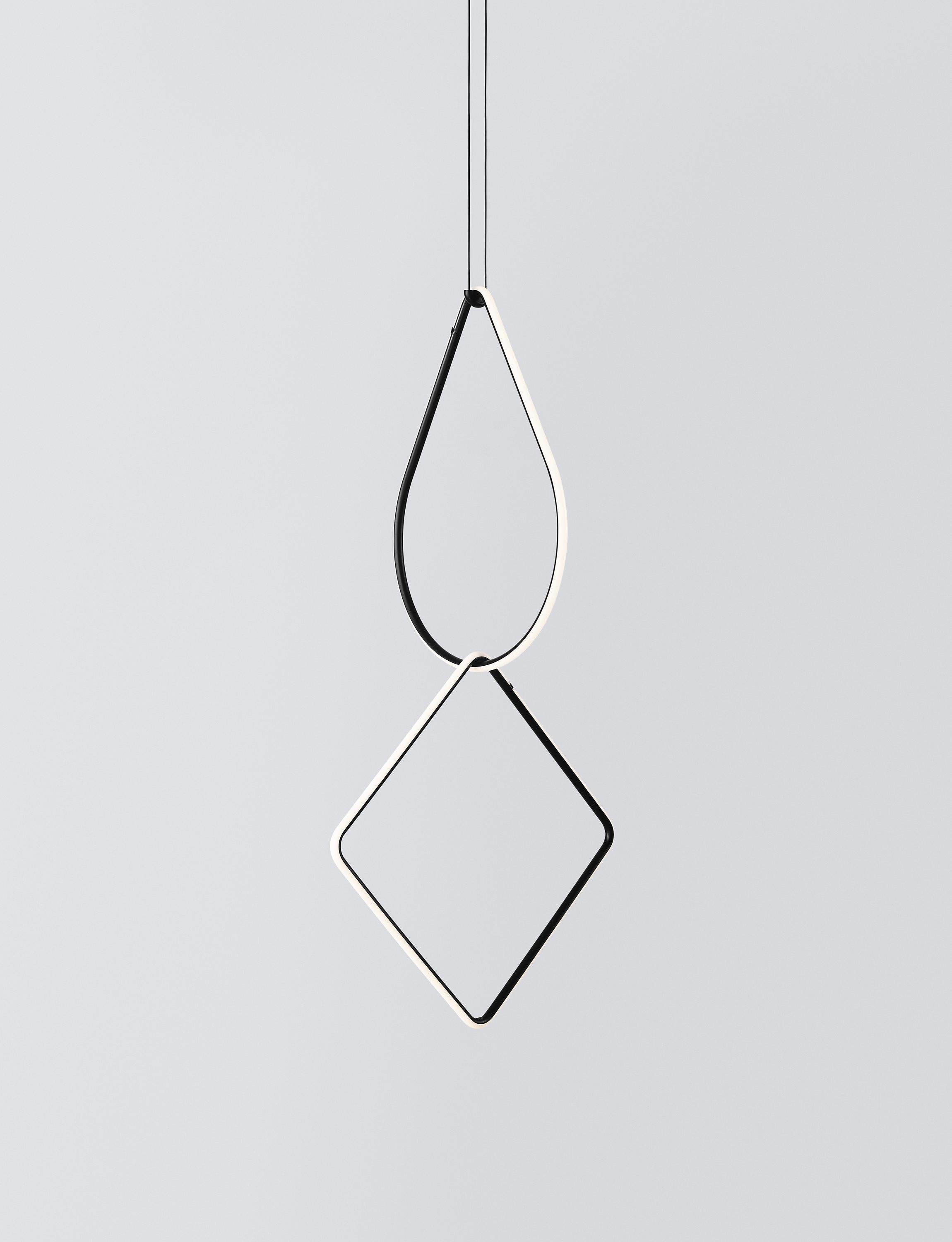 Arrangements is a modular system of geometric light elements that can be combined in different ways, creating multiple compositions into individual chandeliers. Each unit simply attaches onto the previous one as if resting, balancing perfectly as a