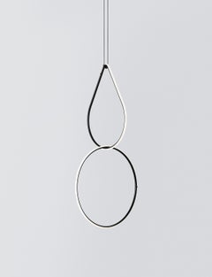 FLOS Tropfen- und mittelgroße Kreis-Leuchte mit Arrangements von Michael Anastassiades
