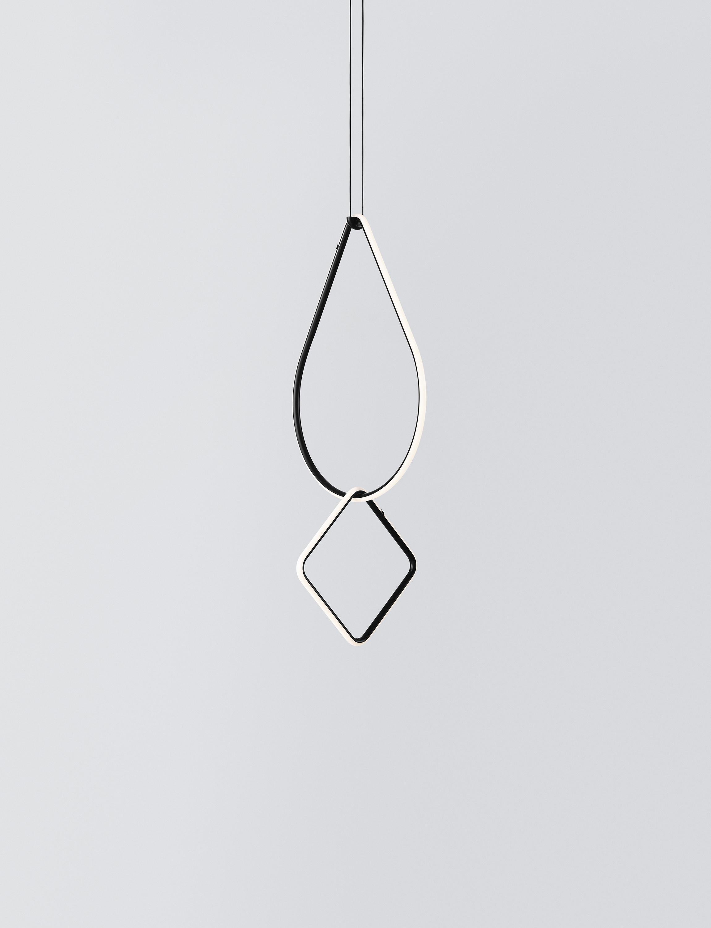 Arrangements is a modular system of geometric light elements that can be combined in different ways, creating multiple compositions into individual chandeliers. Each unit simply attaches onto the previous one as if resting, balancing perfectly as a