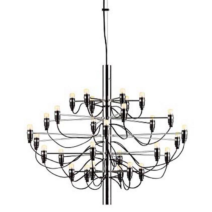 A beautiful Italian light fixture designed by Gino Sarfatti and produced by Flos. This fixture is stunning and warm. The light heads are adjustable. I believe they can even be turn horizontally. This is the 30 light chandelier model 2097/30. This