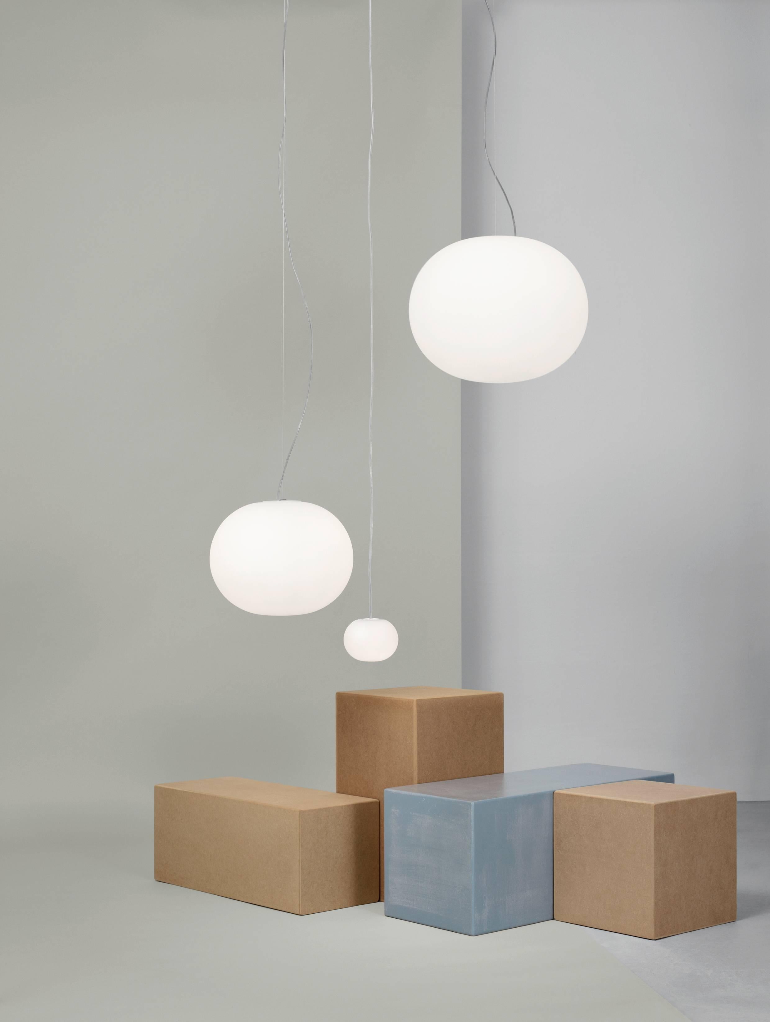 FLOS Glo-Ball S1 Fluorescent Pendant Light by Jasper Morrison
Marrying the functional with the otherworldly, the Glo-Ball S by Jasper Morrison is a remarkably versatile design that punctuates any room it is featured in. Its diffuser is made of