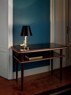 Lampadaire M16 de la collection FLOS Guns en or de Philippe Starck