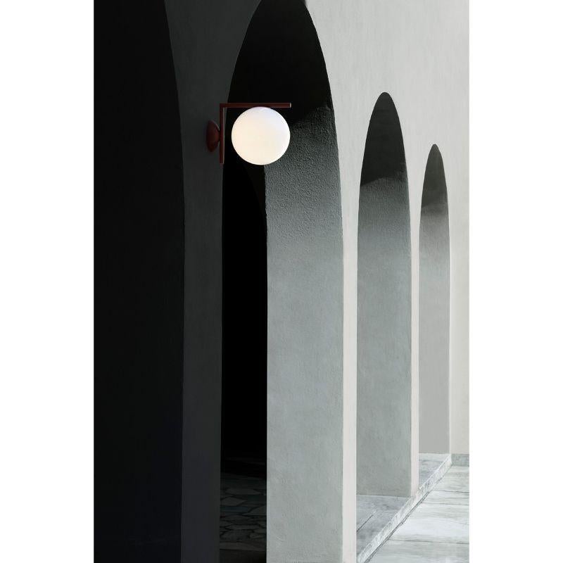 Flos IC Light Outdoor Large Wall Sconce in Deep Brown by Michael Anastassiades

The IC Lights Outdoor collection has expanded to include two sizes of ceiling and wall sconces, CW1 and CW2. Michael Anastassiades’ IC Lights series is a study in