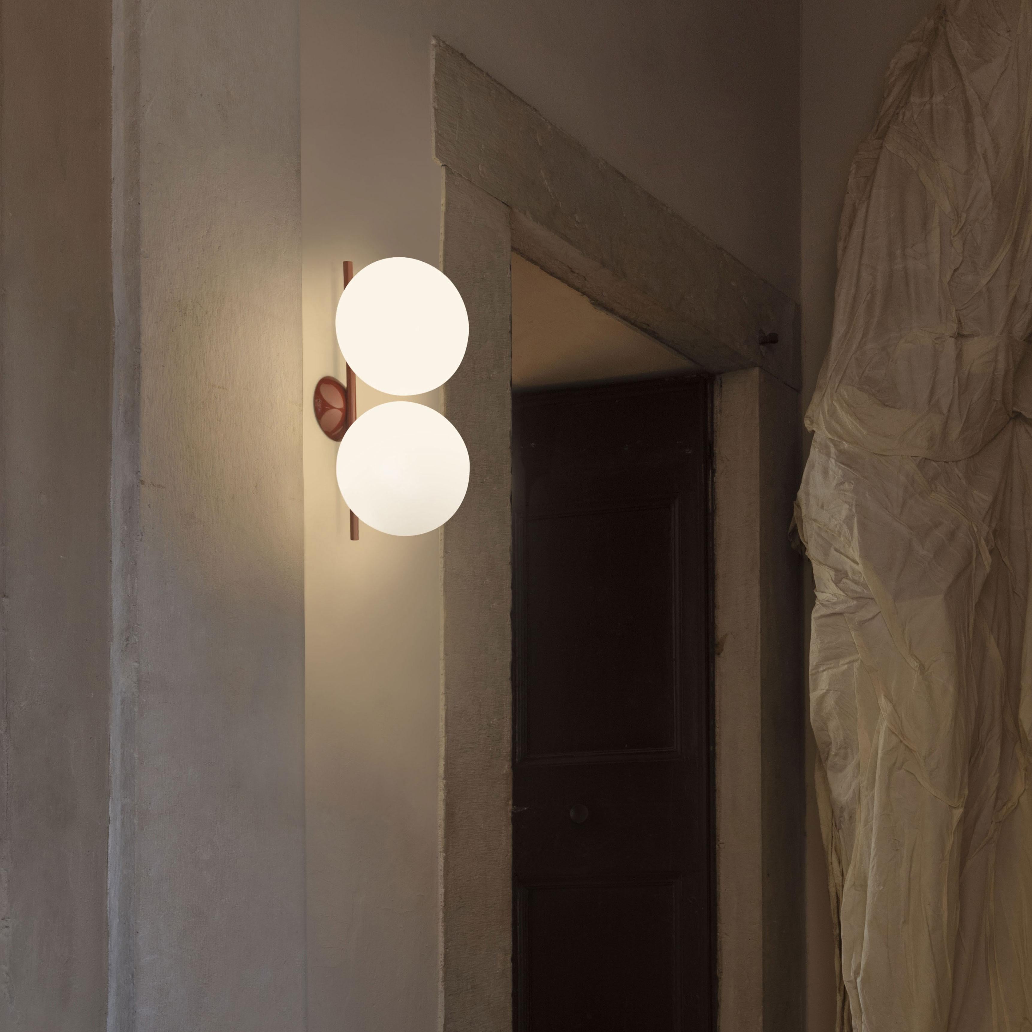 The latest addition to the IC Lights Collection: New IC Lights Ceiling/Wall Double comes with a double light source providing diffused light.The modern ceiling and wall sconce fixture gives a sense of serene calm and elegance to any stairwell,