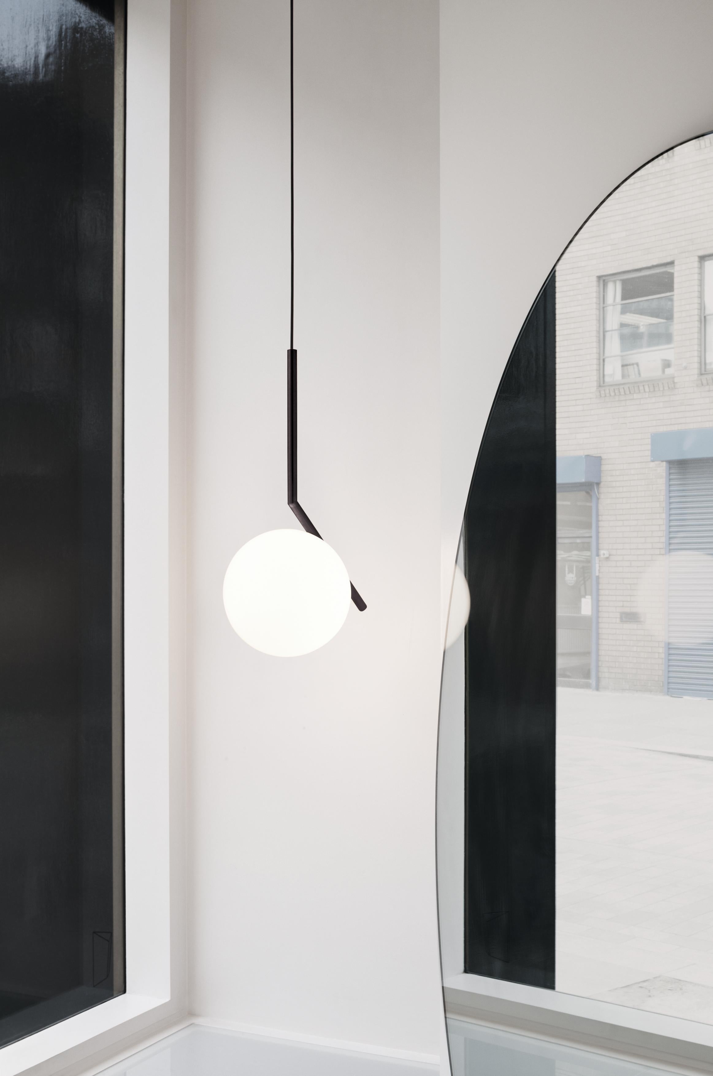 FLOS IC Lights S1 Pendant Light in Black by Michael Anastassiades

Like the other pieces in his IC Light Series, the IC Lights S balances designer Michael Anastassiades’ love of industrial simplicity with intricate symbolism. Providing diffused