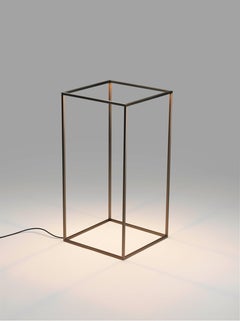 Lámpara de pie de exterior FLOS Ipnos en bronce de Nicoletta Rossi & Guido Bianchi