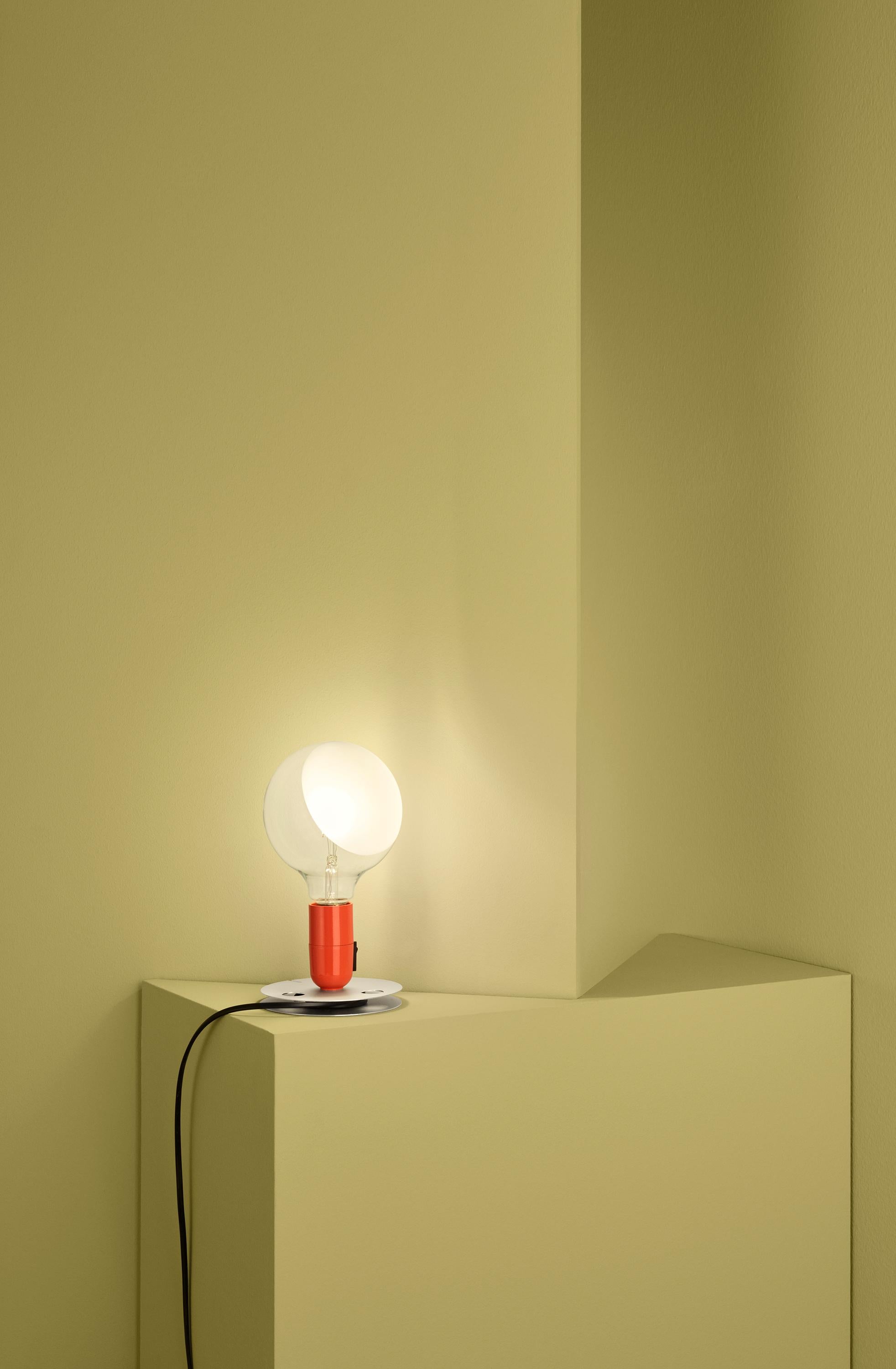 LED Lampadina Lamp

Its name means, literally, “bulb,” and it’s easy to see why with one look at this playful Achille Castiglioni design. This unique table lamp provides direct and diffused light through a partly sandblasted clear globe. Its base is