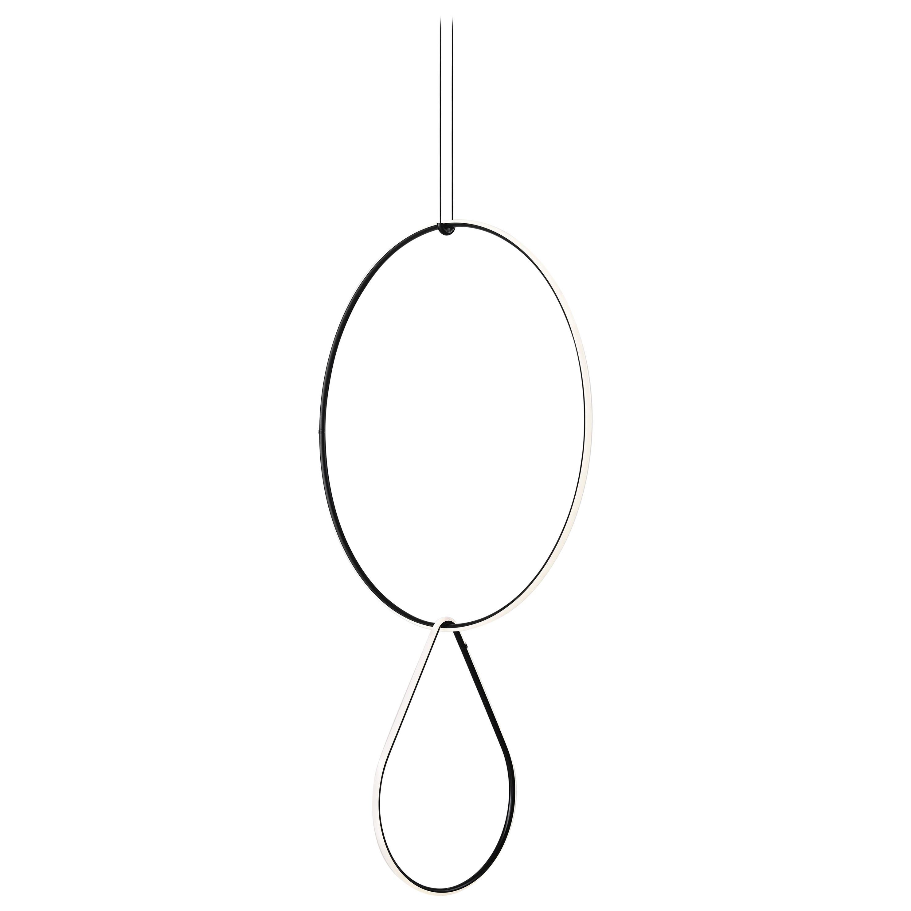 Lampe FLOS, grand cercle et dispositions abaissées de Michael Anastassiades