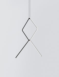 FLOS Arreglos de grandes cuadrados y líneas quebradas Light de Michael Anastassiades