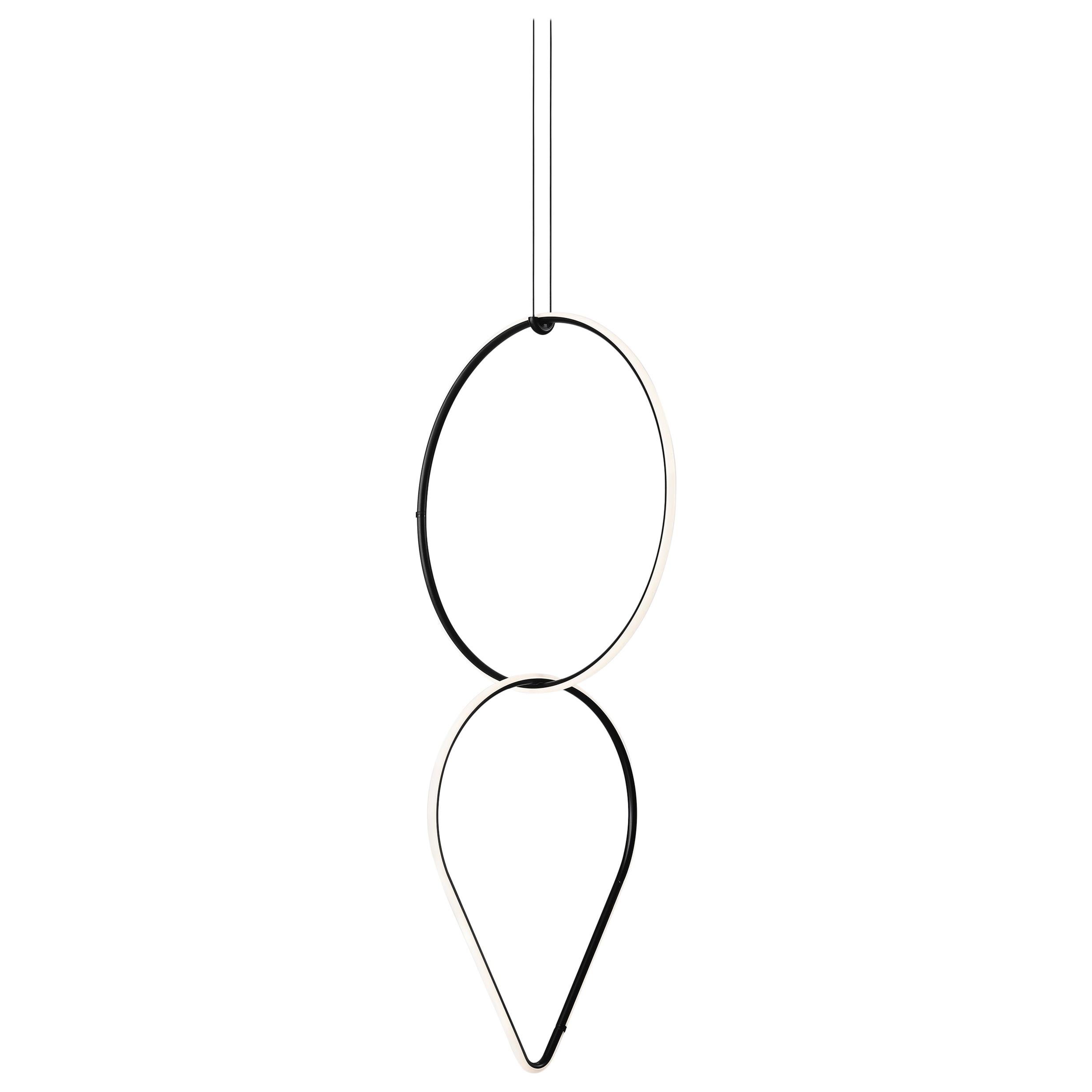 Lampe FLOS cercle moyen et arrangements abaissés par Michael Anastassiades