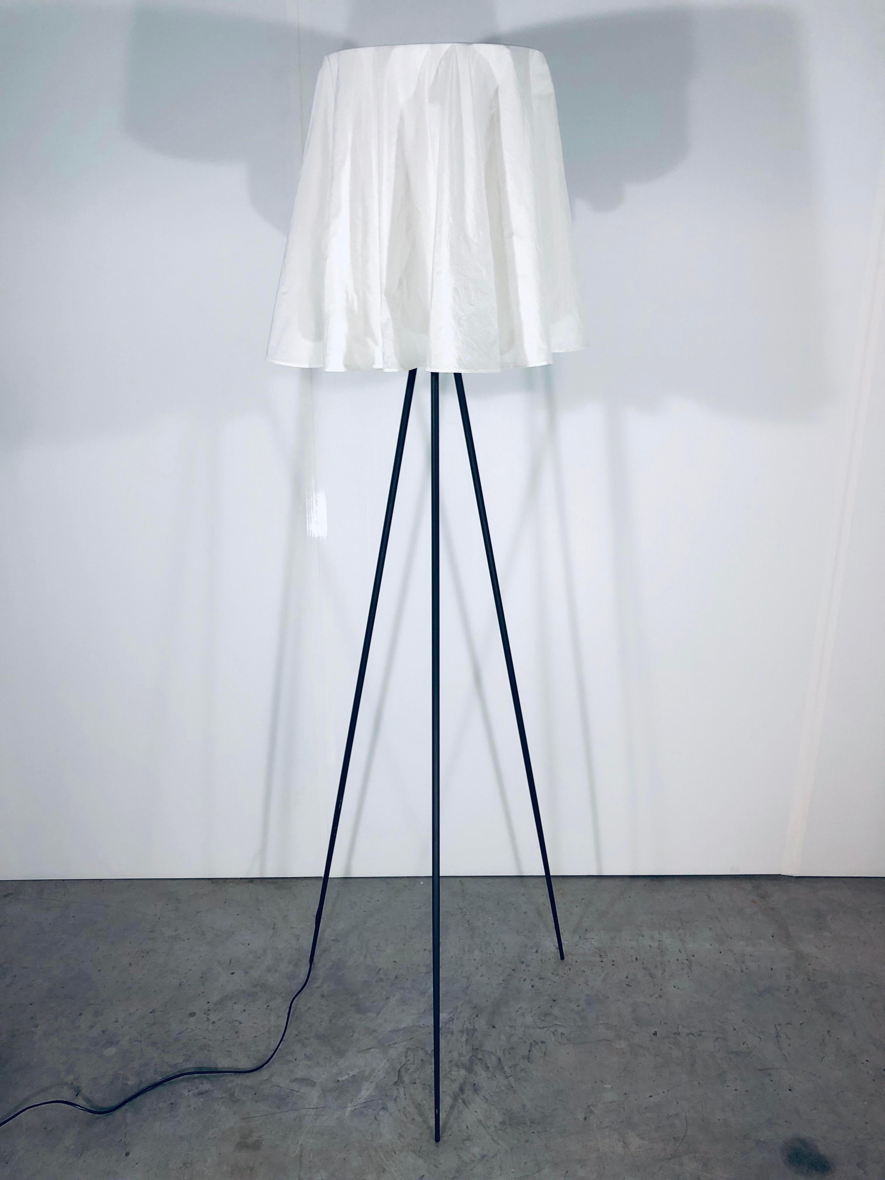 Philippe Starck tripod floor lamp with white cloth shade for Flos.