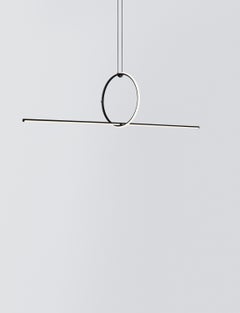 FLOS Kleine Leuchte mit Kreis- und Linienarrangements von Michael Anastassiades
