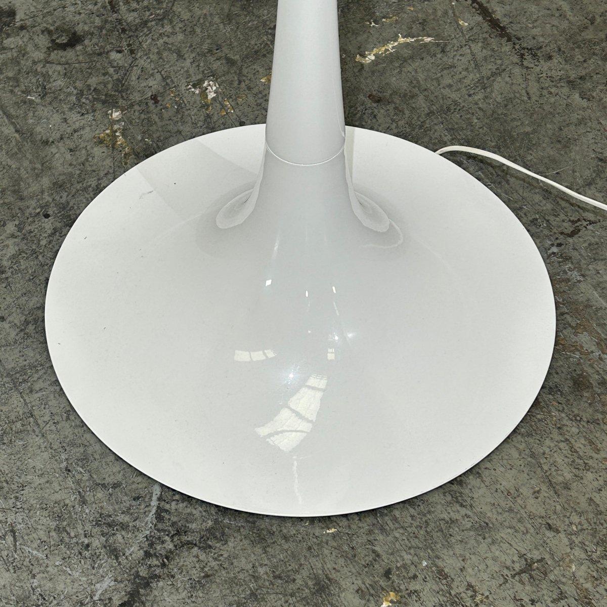 Introducing the Spun Floor Light by Flos, a stunning addition to any modern interior. This sleek and sophisticated floor lamp features a spun metal frame, creating a unique and eye-catching design. The Spun Floor Light is not only a functional