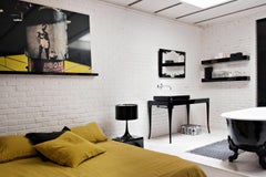 Lampada da tavolo alogena FLOS Spun T1 in nero lucido di Sebastian Wrong