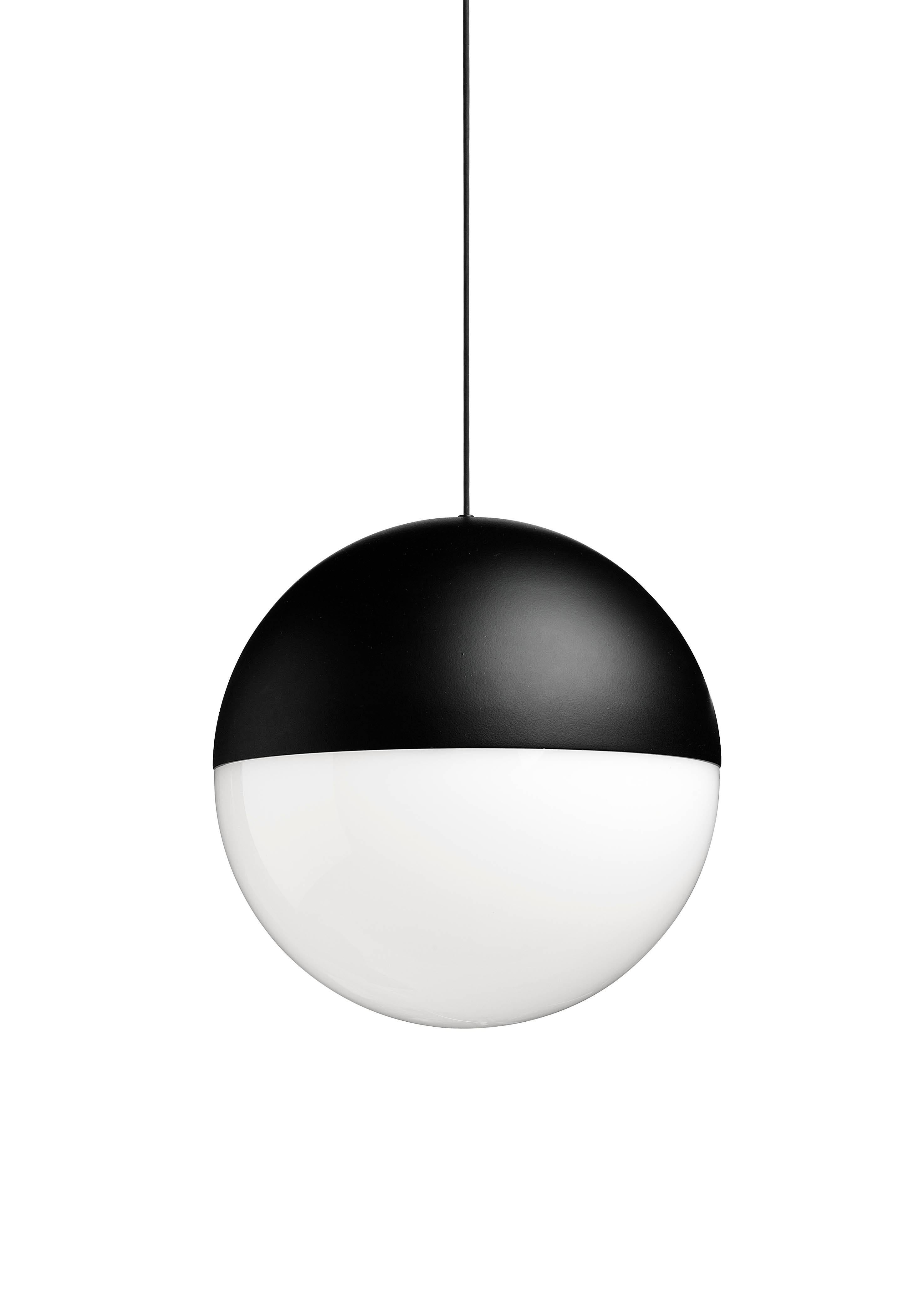 A play of graceful light overhead, String Lights by Michael Anastassiades adds a streamlined sophistication to your home or office. Providing diffused light, the suspension lamp features a matte black varnished die-cast aluminum body coated with