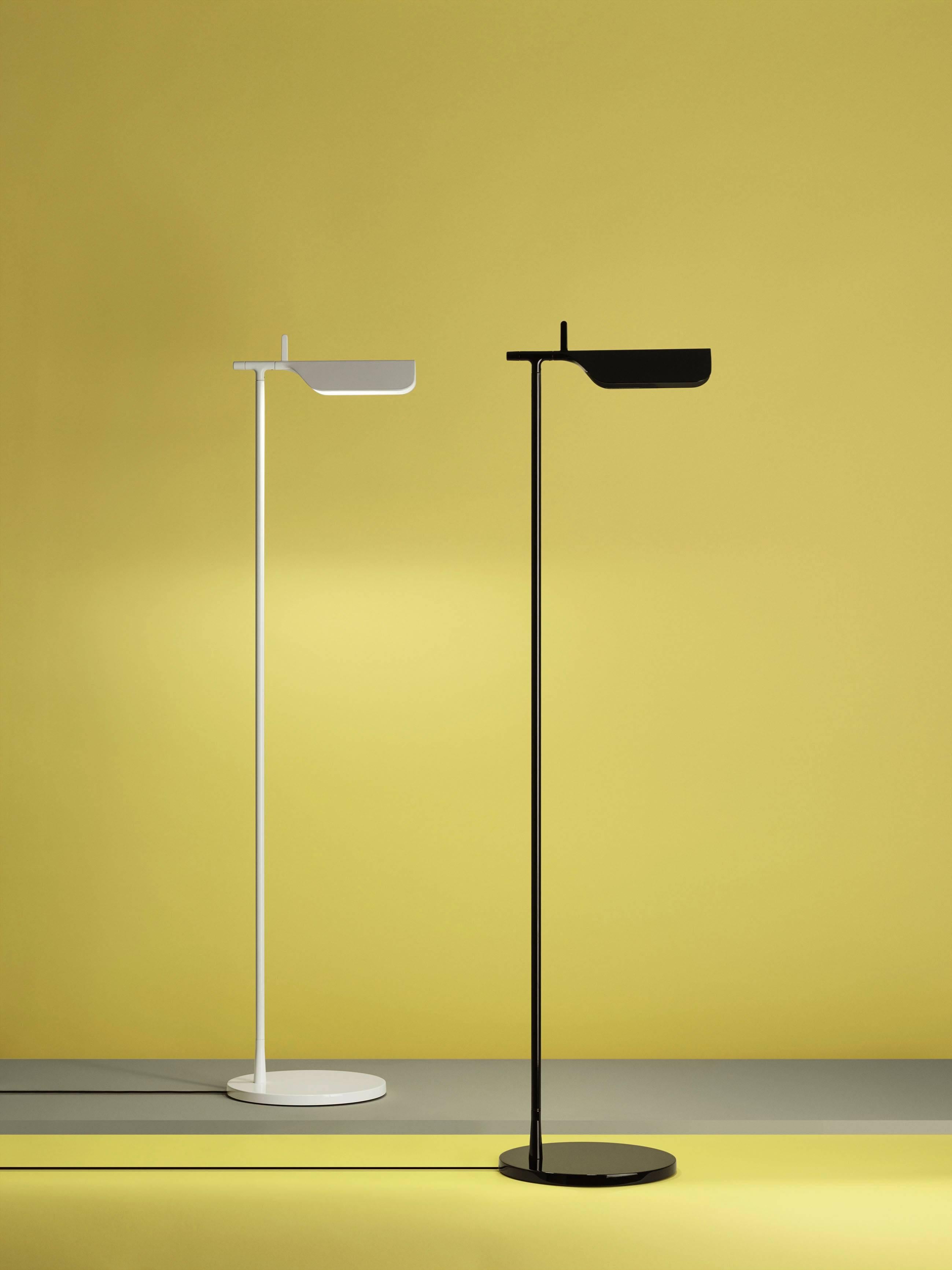 Brought to life by the design duo of E. Barber and J. Osgerby in 2011, the Tab F floor lamp is a tribute to the spirit of innovation. This modern floor lamp has an adjustable head with a 45-degree rotation capability and a body painted with