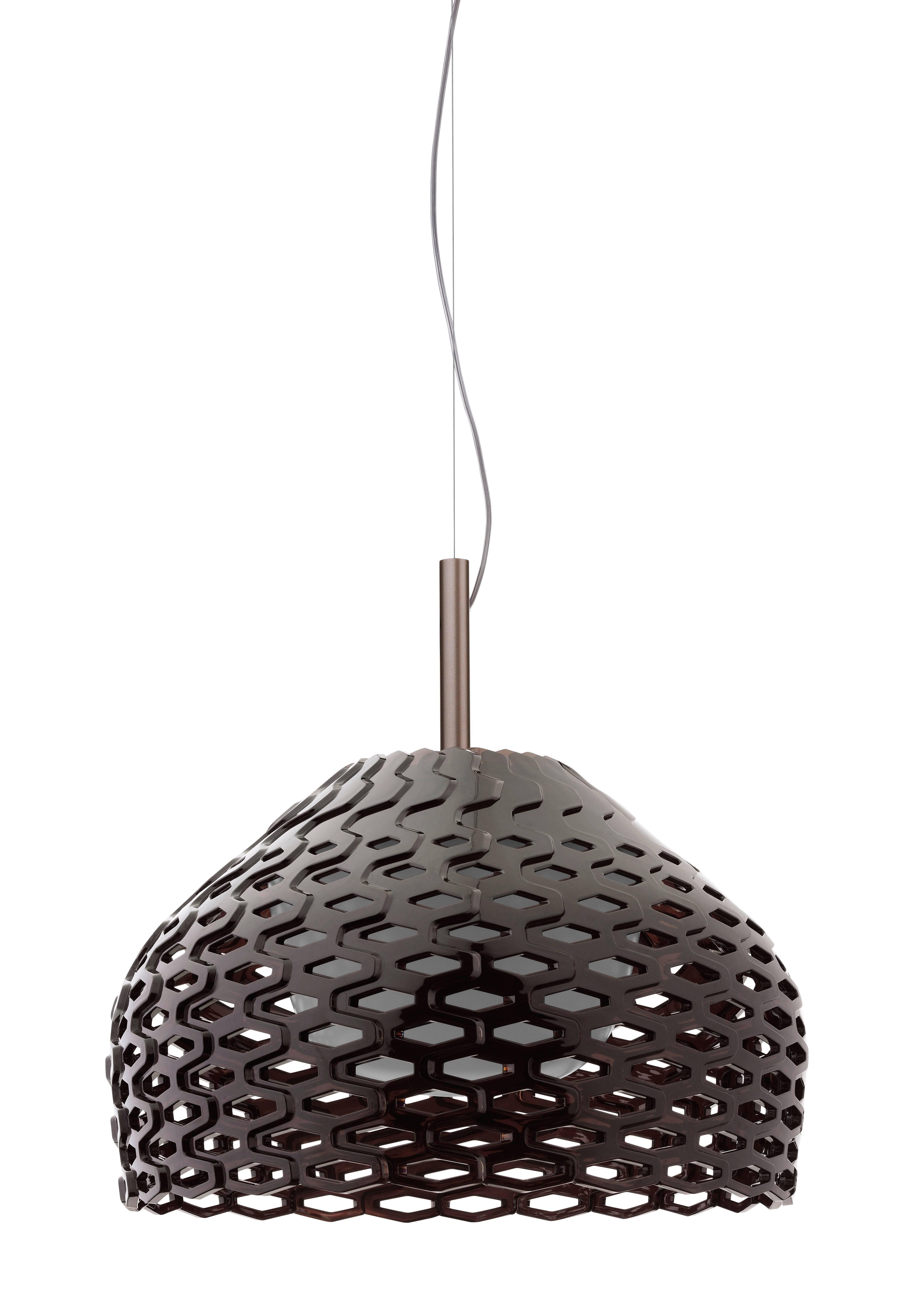 Its name is French for “armadillo,” the unassuming animal whose brilliant structure keeps it protected and makes it unique. Designer Patricia Urquiola conceptualized this table lamp to play on the filtration of light, with remarkable results.

The