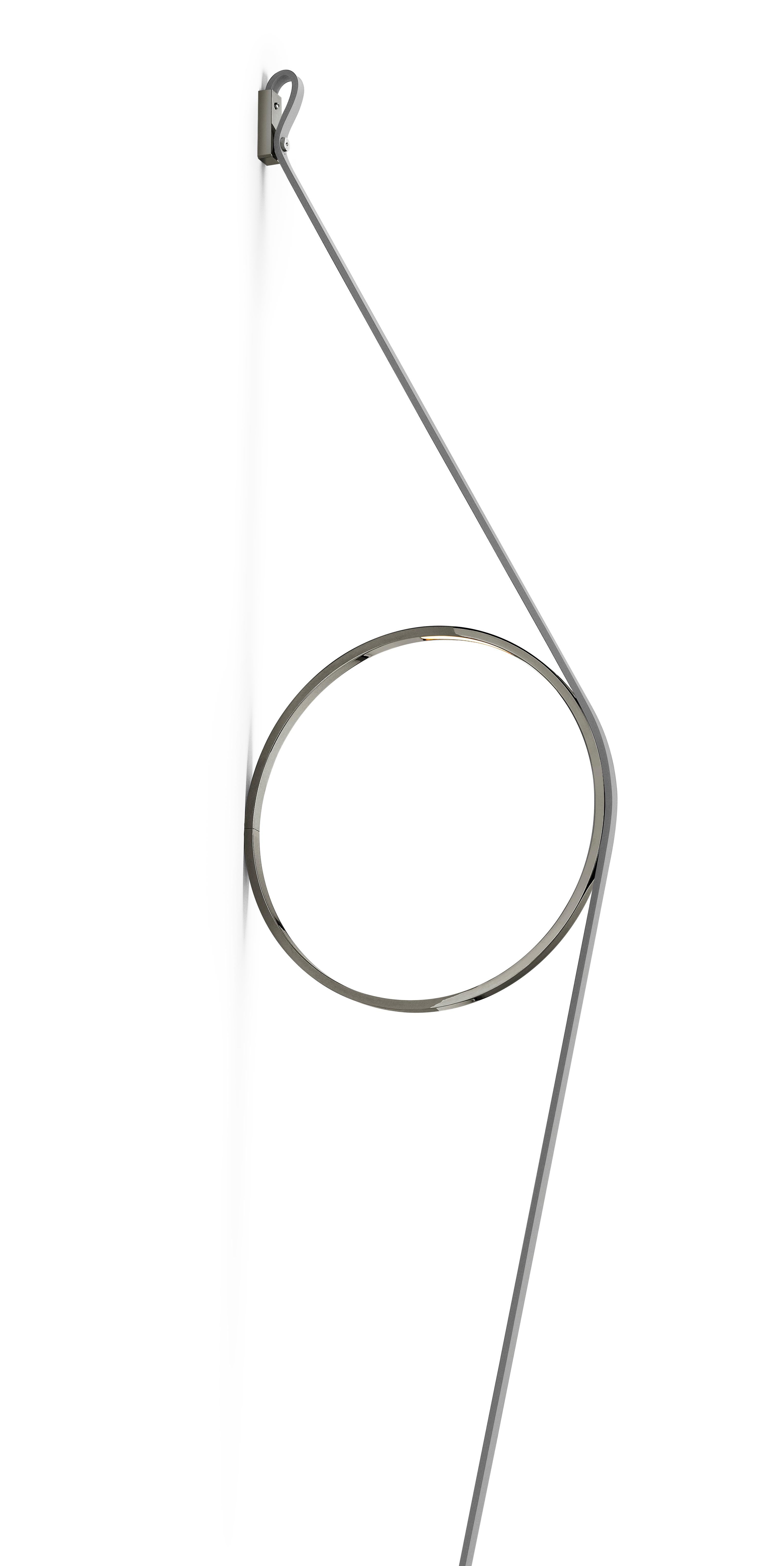 An exercise in reduction, stripped back to its most essential elements, offering beautifully rendered light. The wire holds a simple ring fitted with an LED strip. The cable and ring are available in different color combinations and a range of