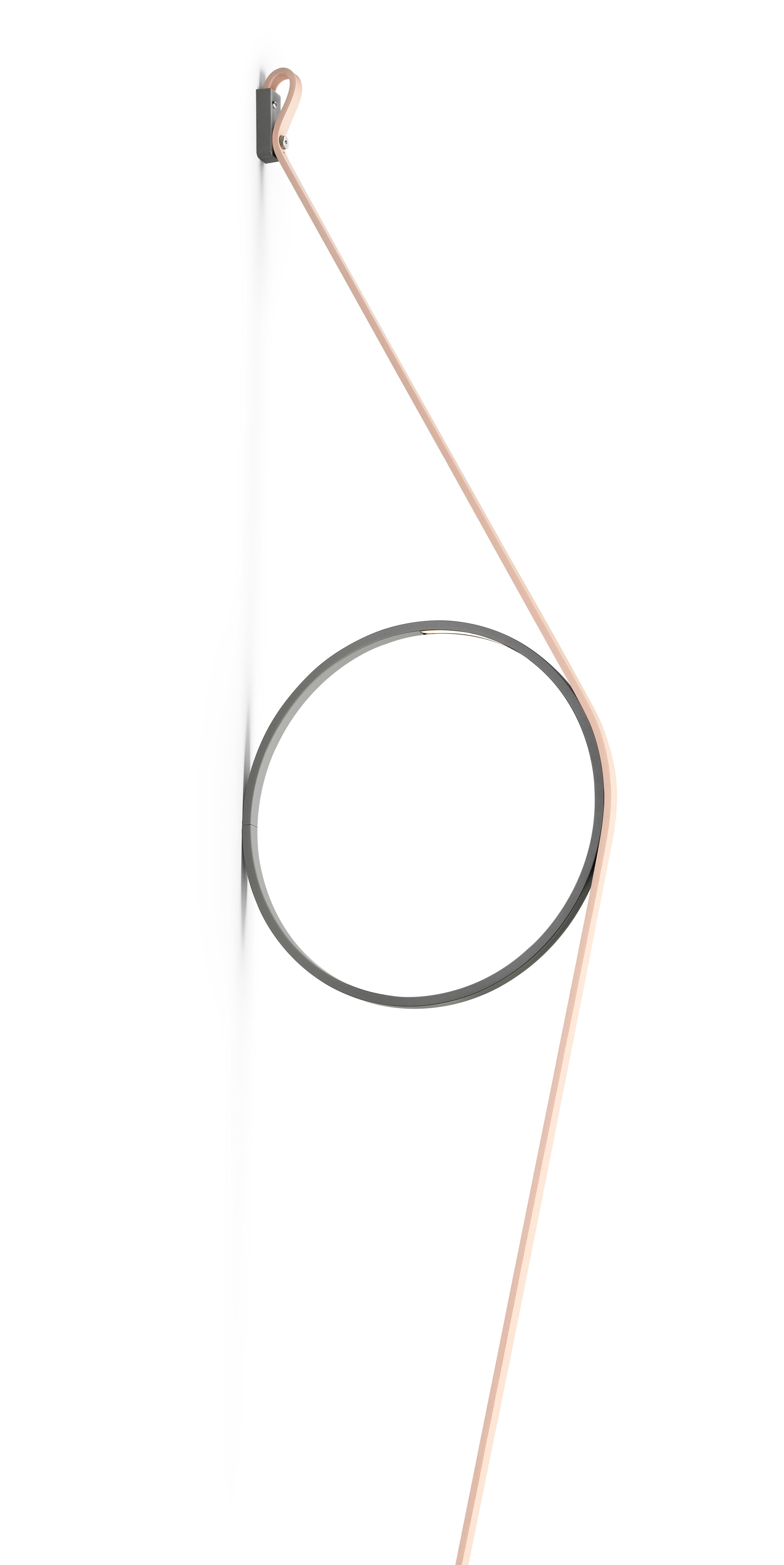 An exercise in reduction, stripped back to its most essential elements, offering beautifully rendered light. The wire holds a simple ring fitted with an LED strip. The cable and ring are available in different color combinations and a range of