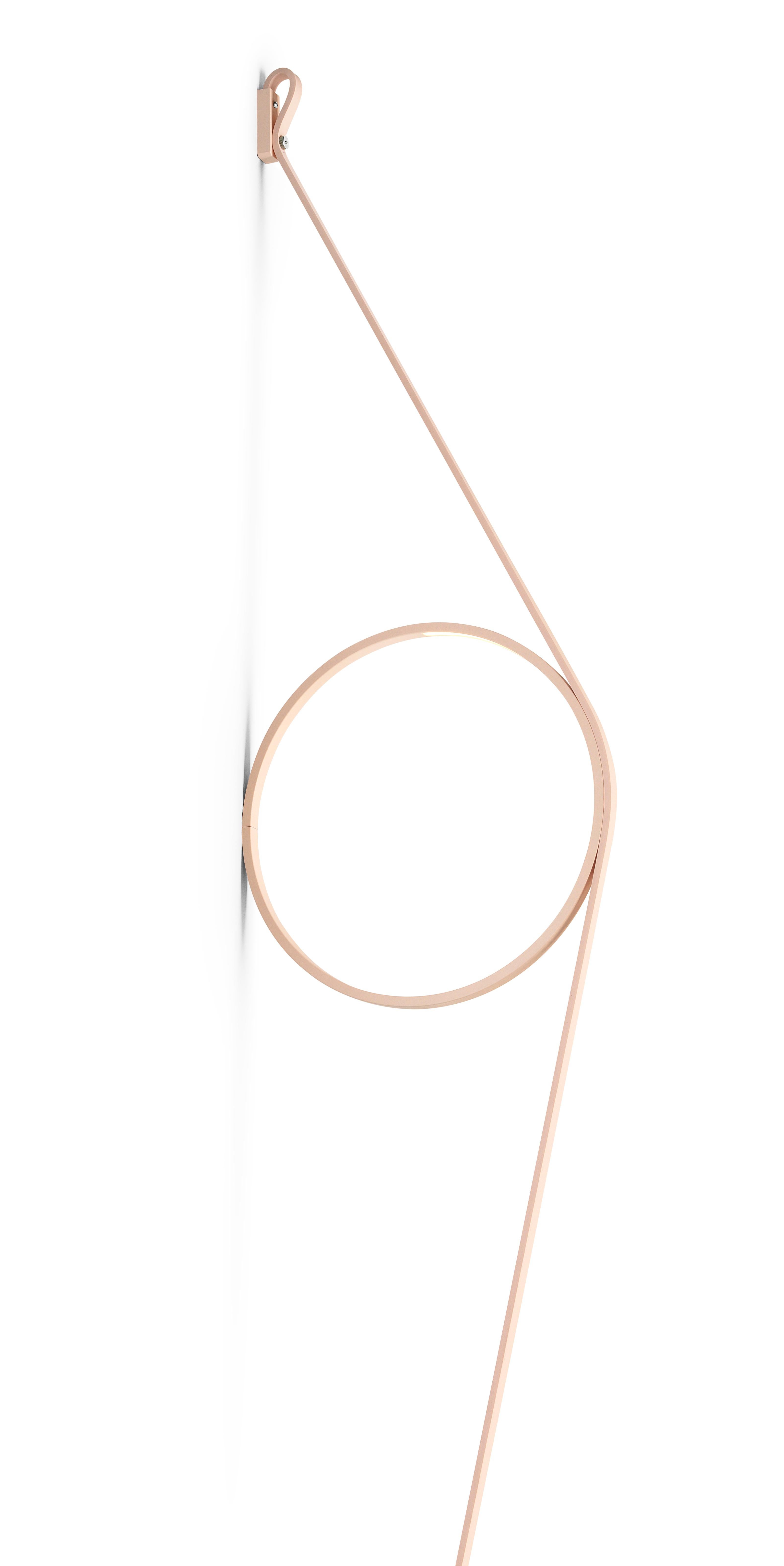 An exercise in reduction, stripped back to its most essential elements, offering beautifully rendered light. The wire holds a simple ring fitted with an LED strip. The cable and ring are available in different color combinations and a range of