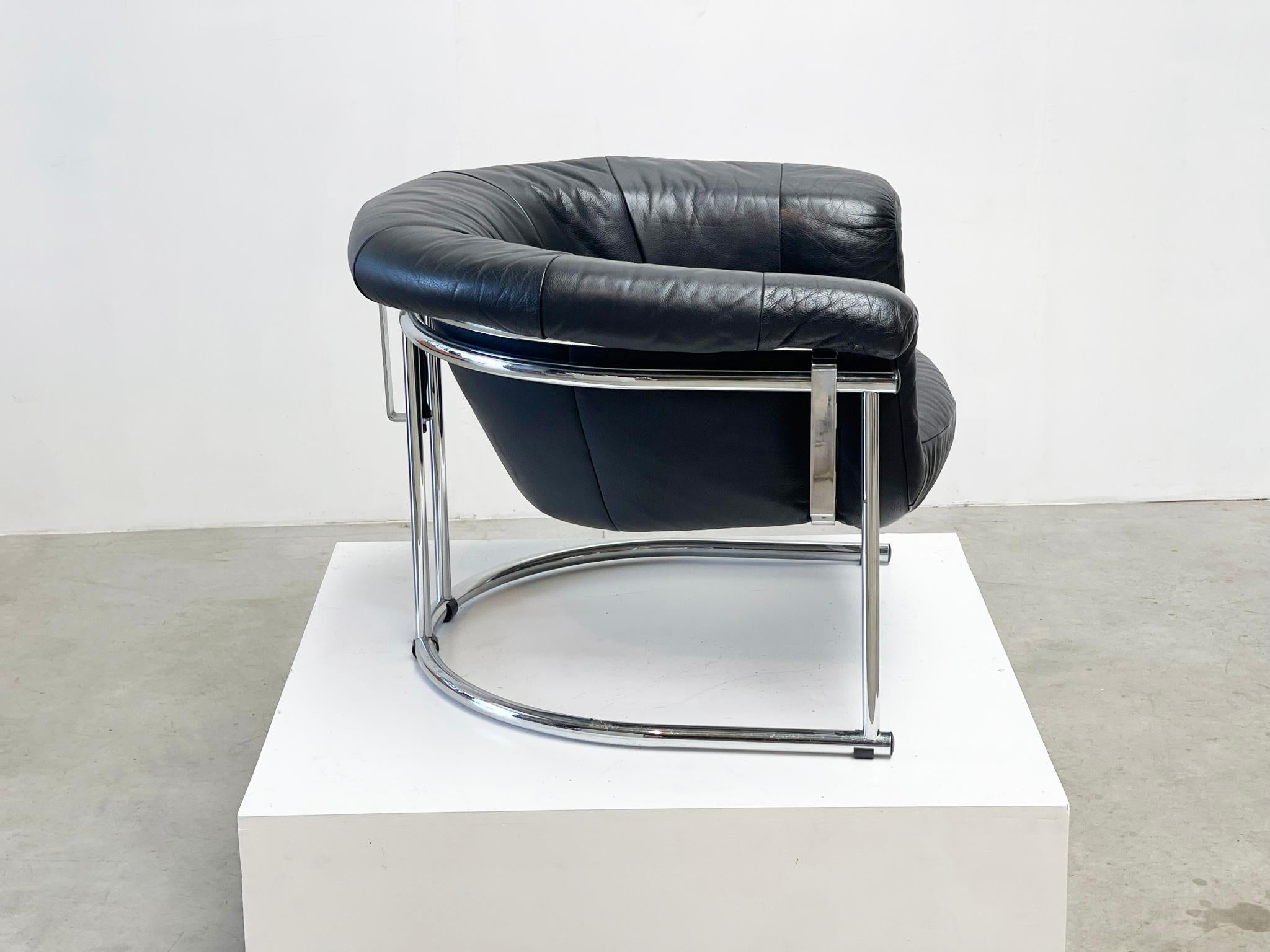 Experience luxury and style with our Italian floating chair, featuring a sleek chrome frame and high quality black leather seat. Elevate your living space with this midcentury piece, where comfort meets sophistication.

 

Measurements: 

Width: