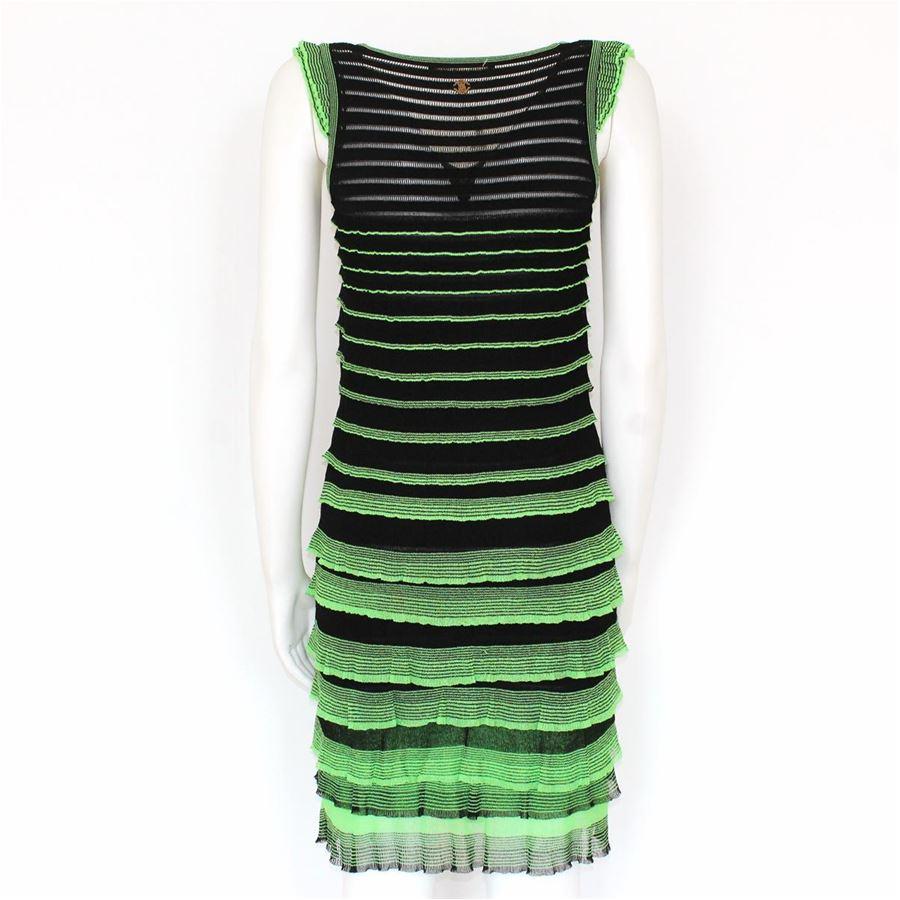 Mixed textile Flounces Green on black Size S IT 40/42 Total lenght (shoulder/hem) cm 86 (33.8 inches)

