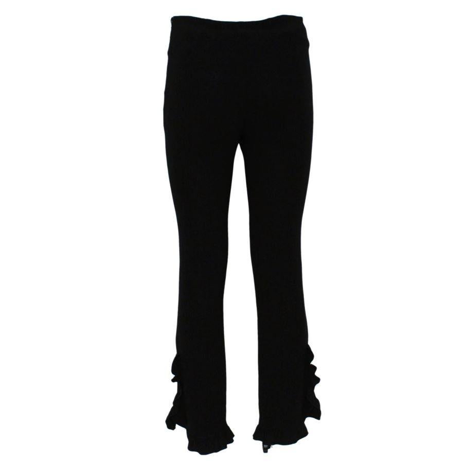 Polyester Black color With flounces lateral zip closure Length cm 92 (36.2 inches)
