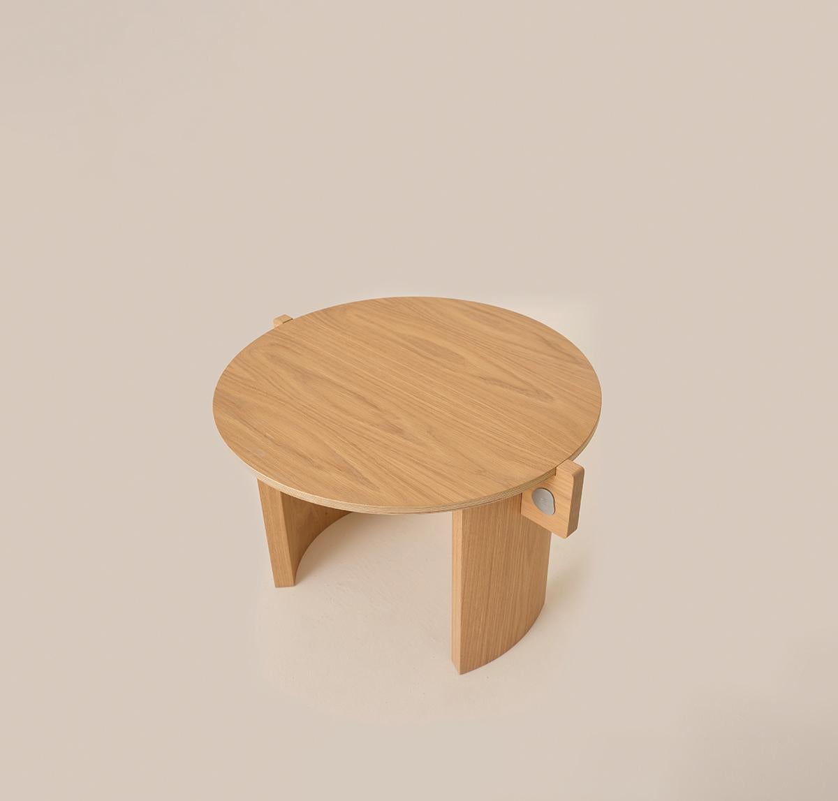 The round Flow Coffee Table Mini with rounded edges, contours its form by curved two legs closer to each other. The linear skeleton joins into the legs to create a well-proportioned base for the table top.
Crafted from oak wood, the low piece