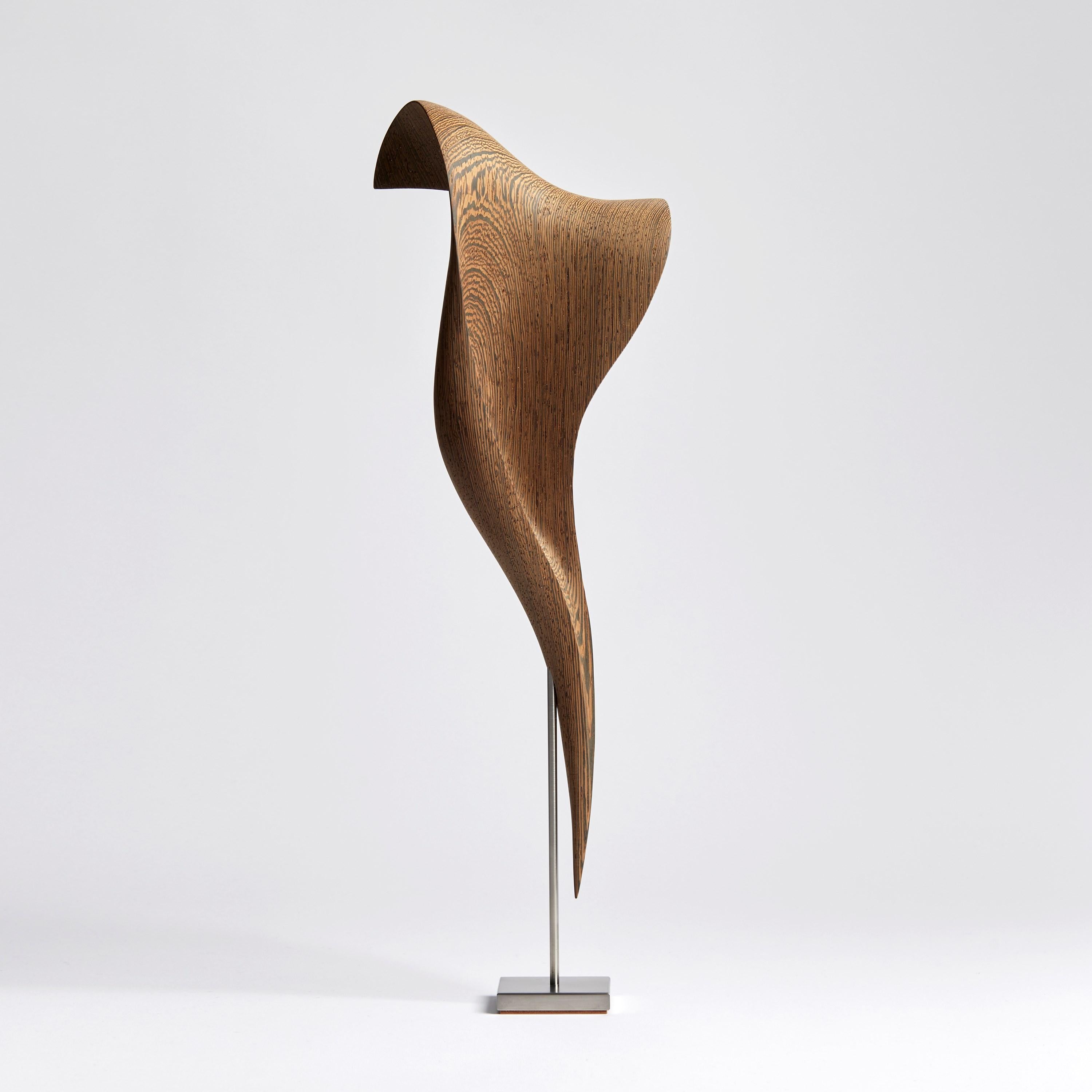 'Flow Petit No 3 ' is a unique artwork by the Danish artists, Egeværk. It is created from Wengé sourced from Africa - Congo and Cameroon - (wood, FSC* certified) with a stainless steel foot. Signed on the base.

The Flow Series created by Egeværk