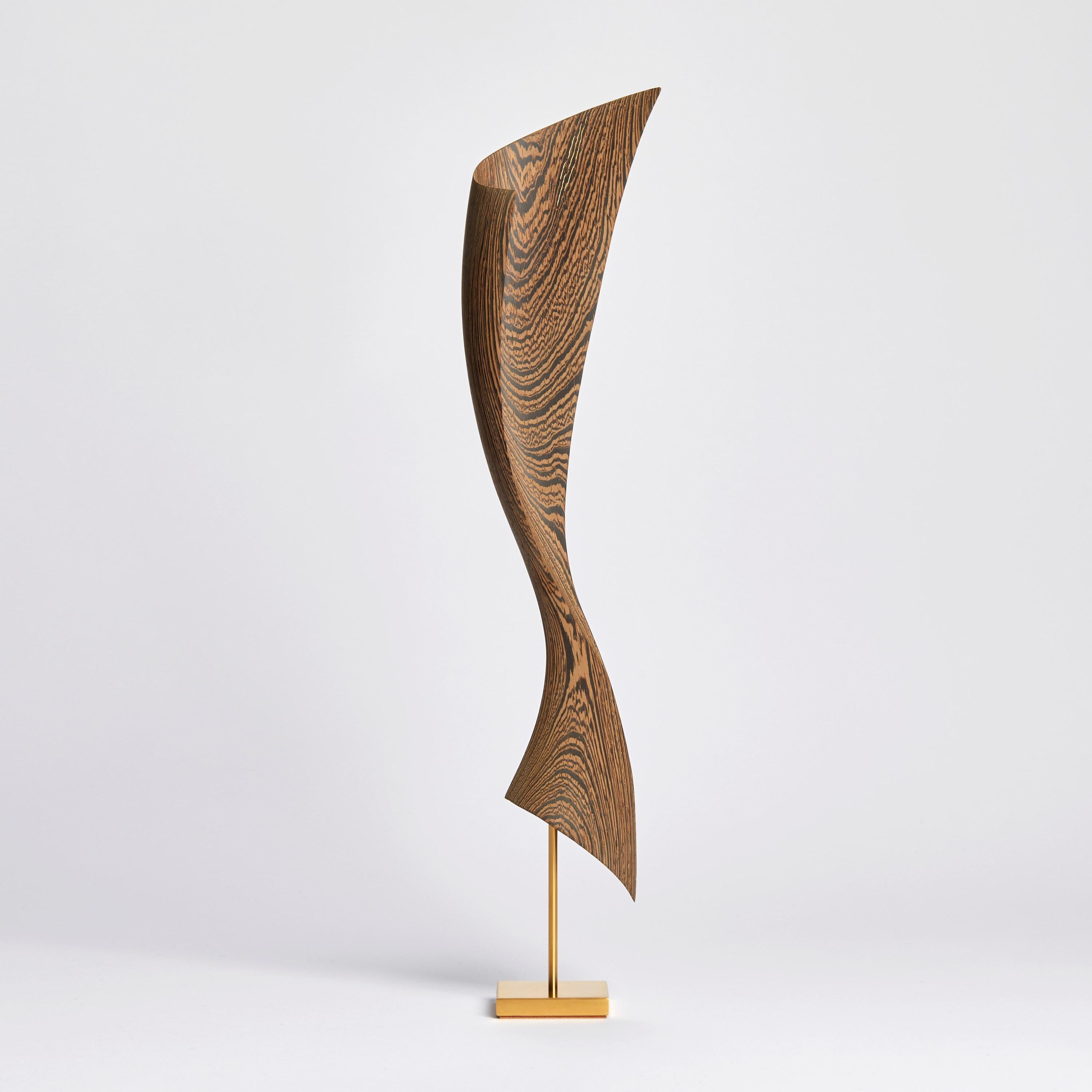 'Flow Petit No 7' is a unique artwork by the Danish artists, Egeværk. It is created from Wengé sourced from Africa - Congo and Cameroon - (wood, FSC* certified) with an inlay of 24ct fine gold and gold plated stainless steel foot. Signed on the