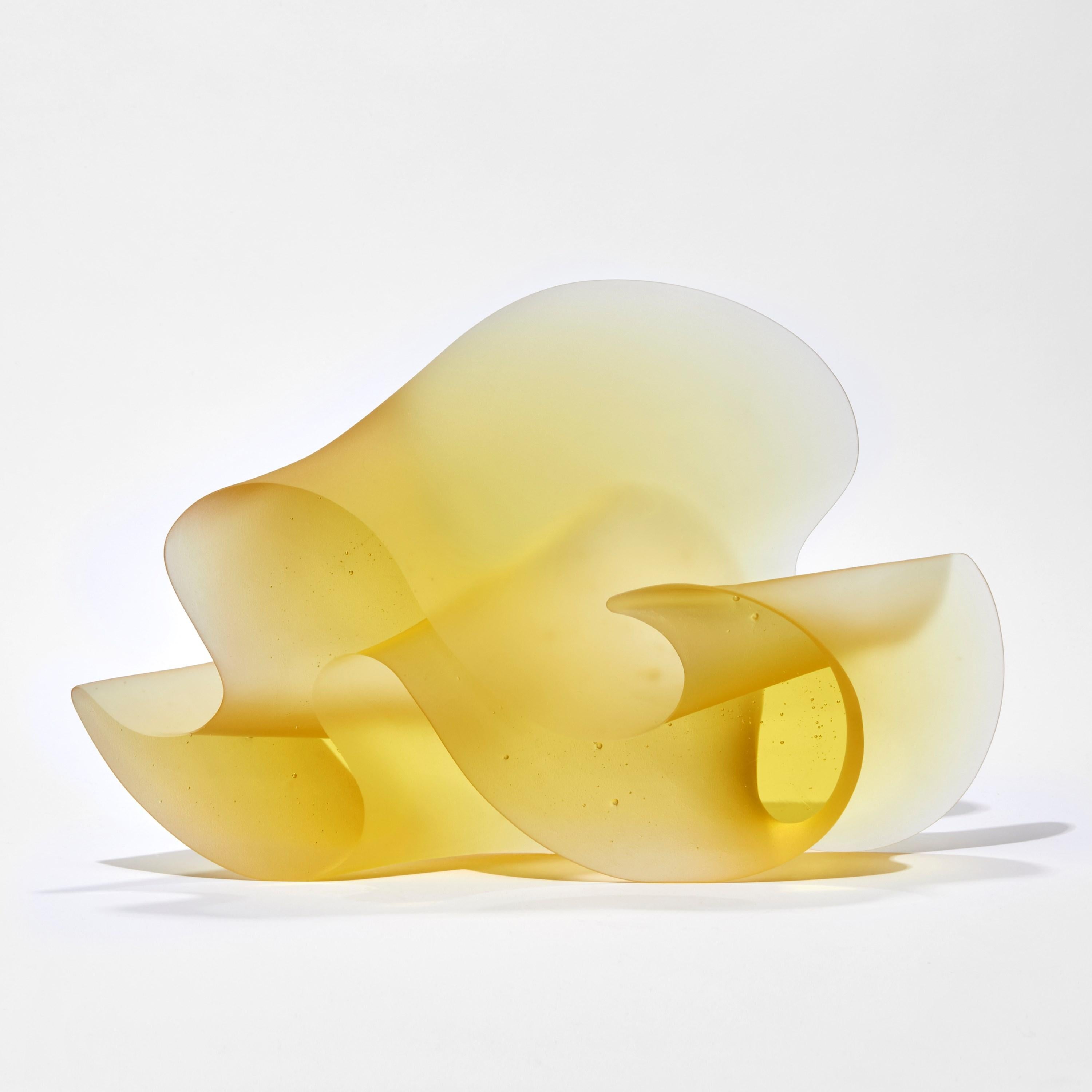 'Flow Yellow' is a unique cast and hand-made glass sculpture by the Danish artist, Karin Mørch.

Mørch’s inspiration often derives from simple expressions and in the contrast between the linear and the tilted. She sees beauty in the natural realm