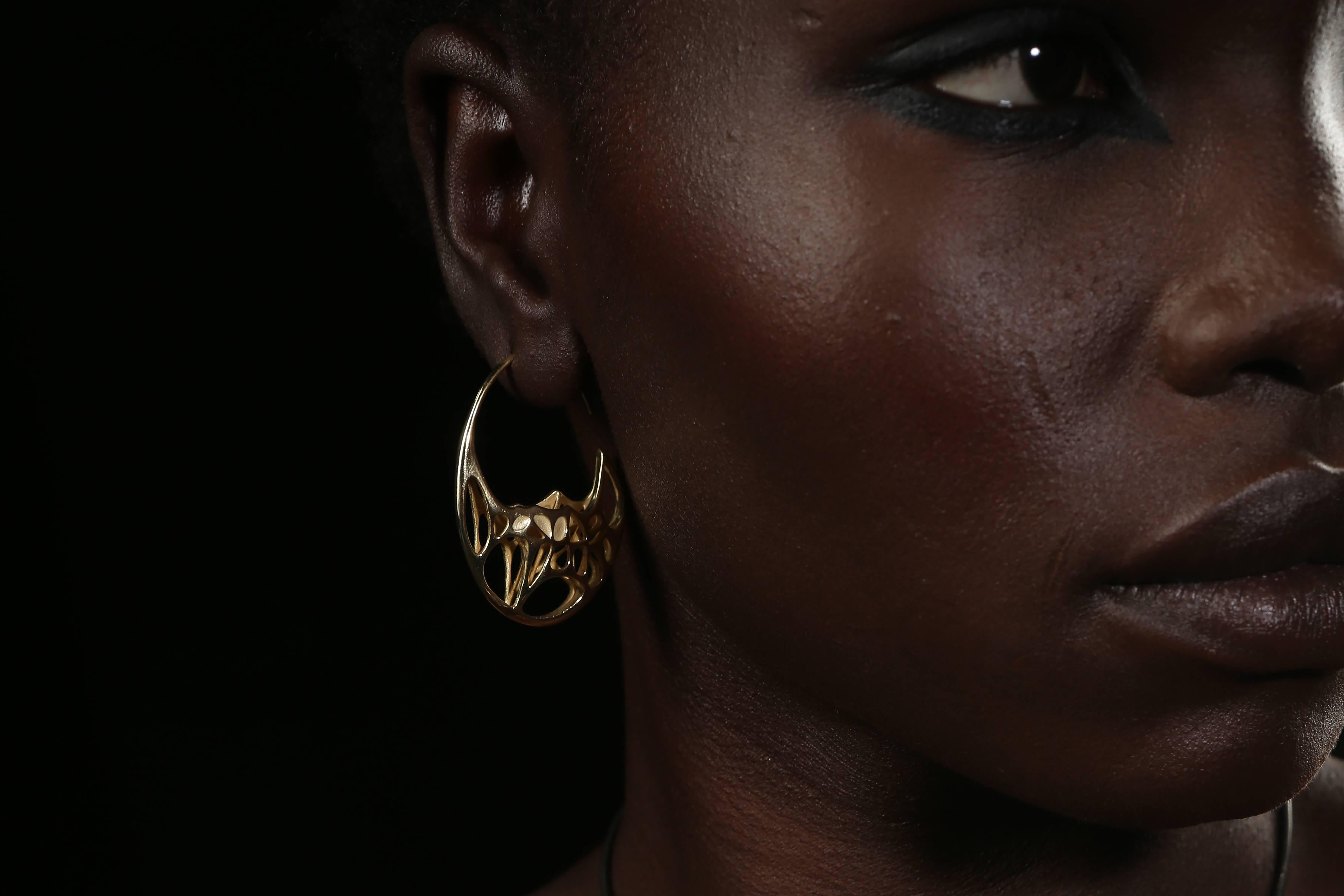 The GODA  hoop earrings are part of an innovative wearable art collection known as 