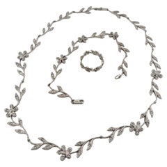 Collana con diamanti Flower 0,60ctw e bracciale e anello in oro bianco 14K